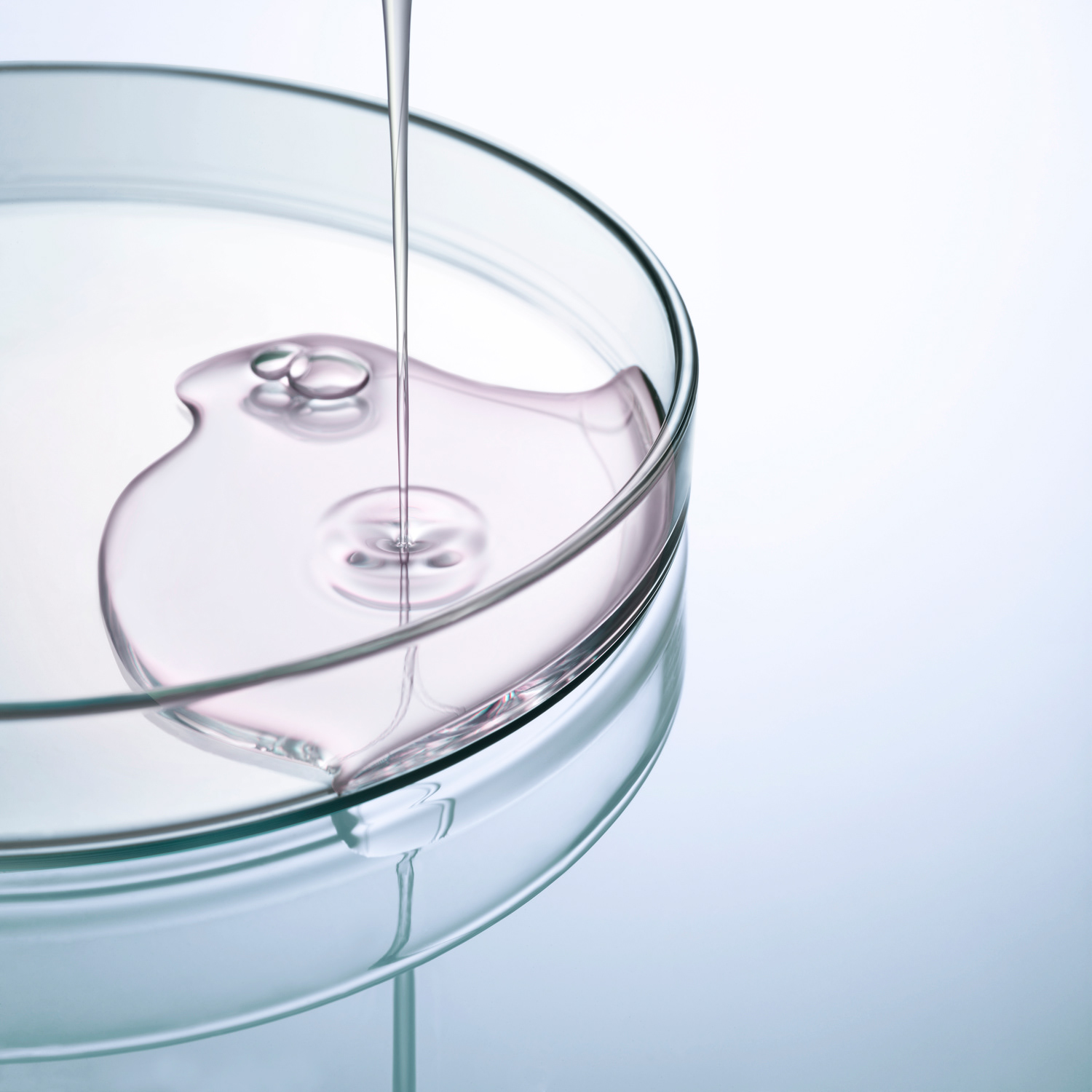 Still life photo La Prairie Cosmetics, pink liquid on a petri dish, Julie Chanut-Bombard