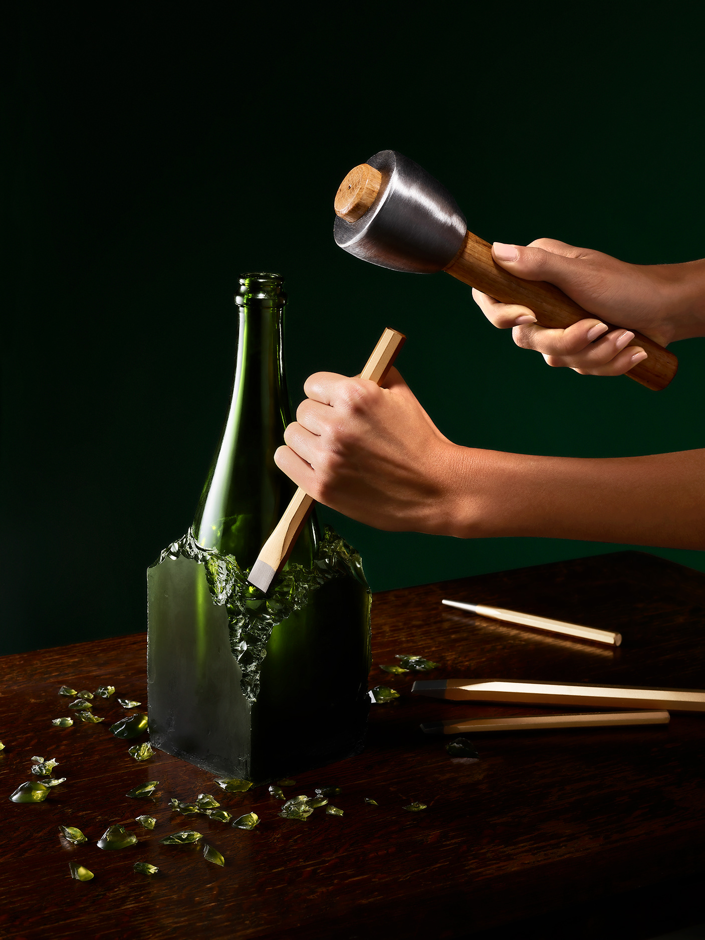 Taittinger, PALAST - still life photography, hand model, a bottle being carved from a block of green glass,  Paris France