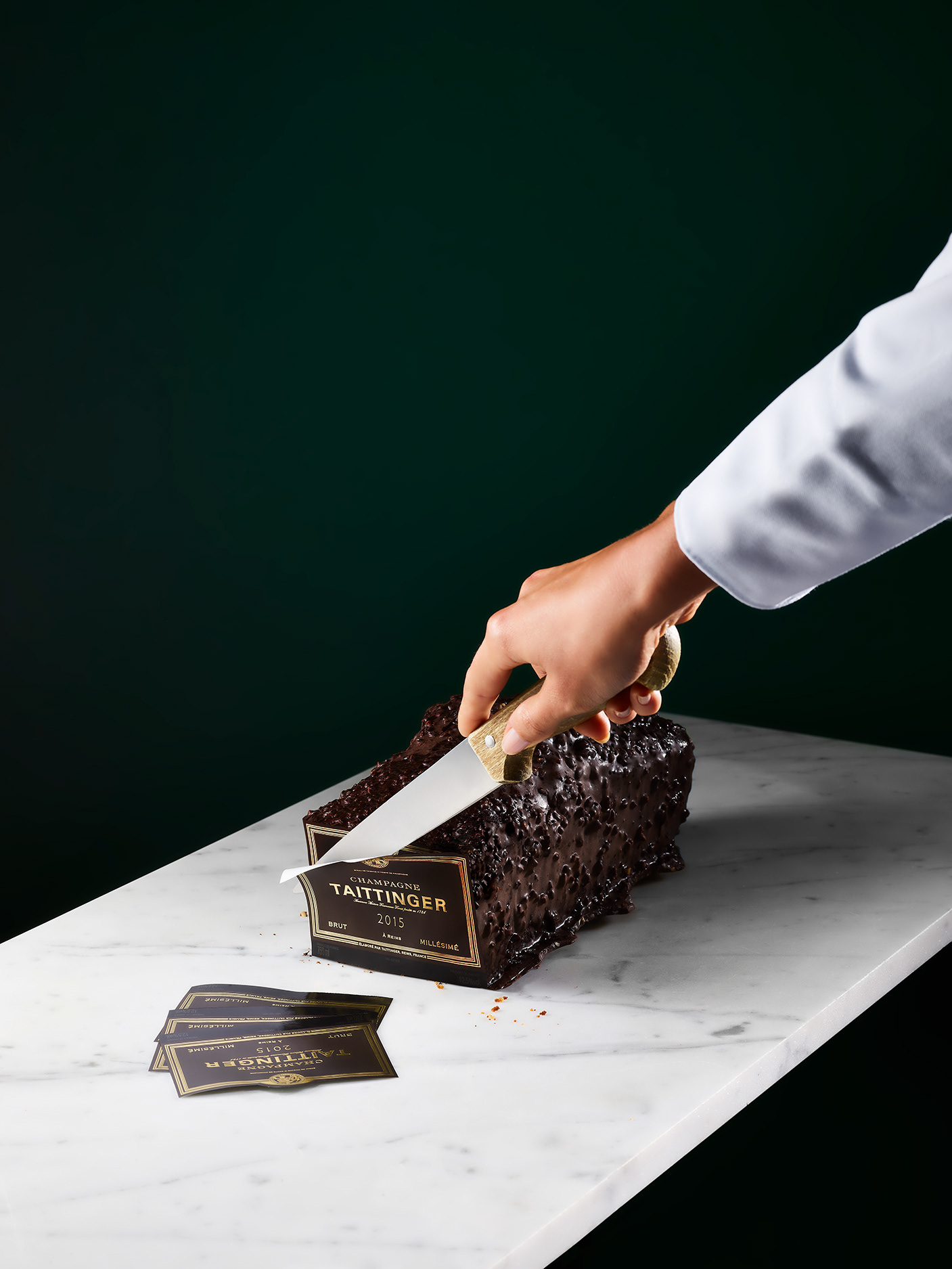 Taittinger, PALAST - still life photography, hand model, Taittinger champagne labels cut from a cake,  Paris France