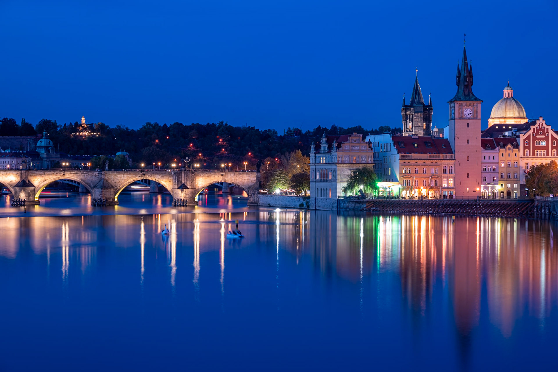 Smetanovo nabrezi with Charles Bridge over Vltava River