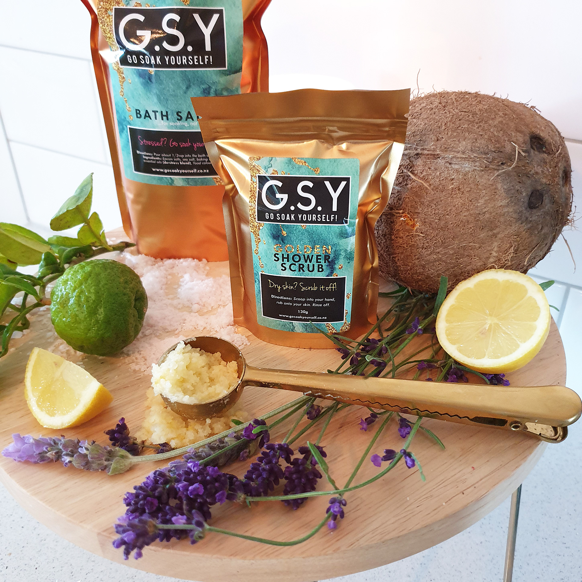 GSY bath salts and shower scrub - scent ingredients styled product photography