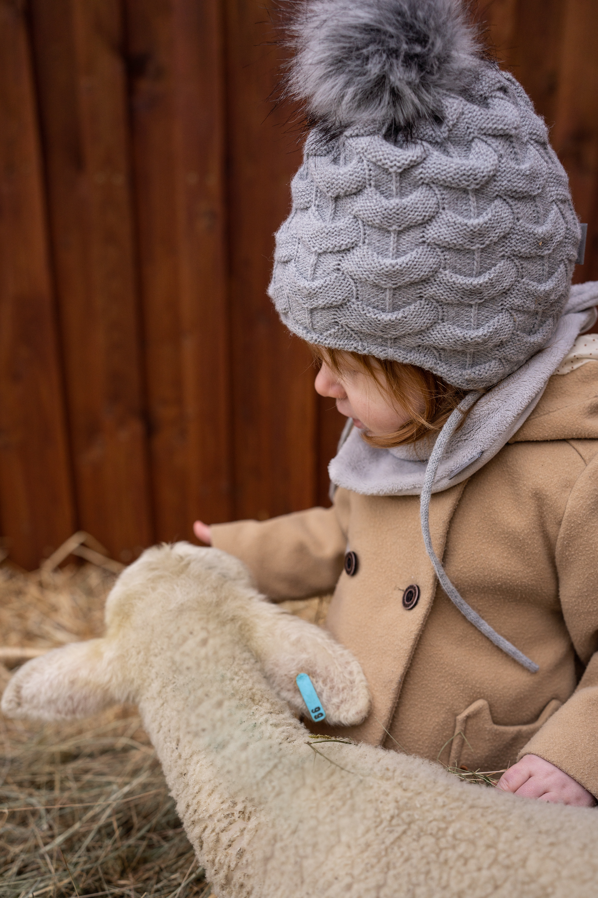 Kinderfotos mit Lämmern