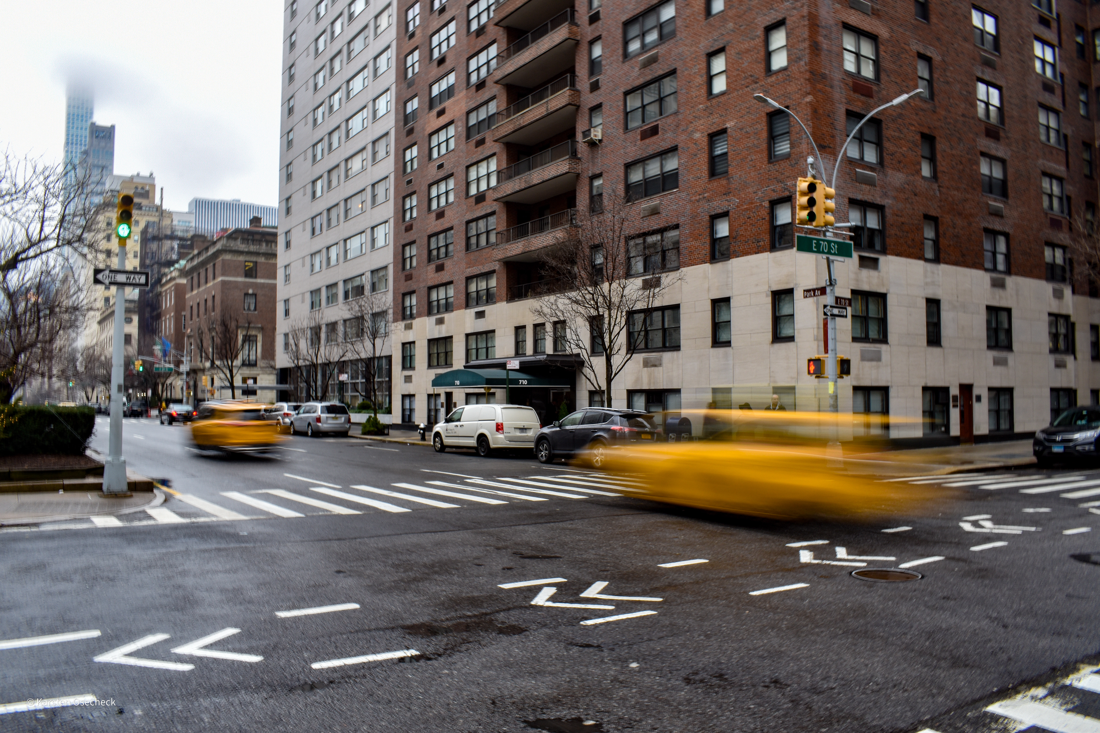 Taxis whizzing by on Park Ave