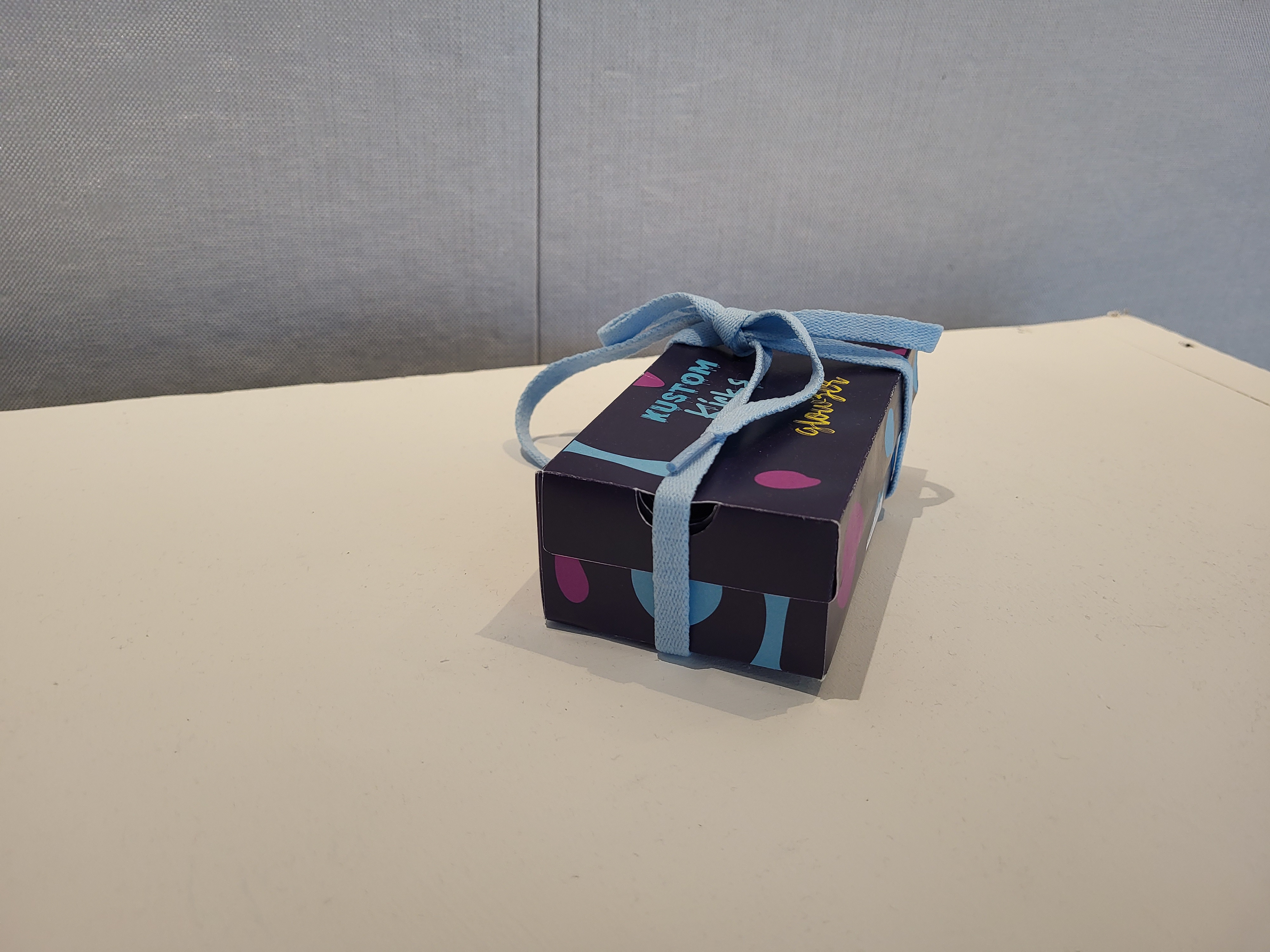 Side view of printed collaboration shoebox