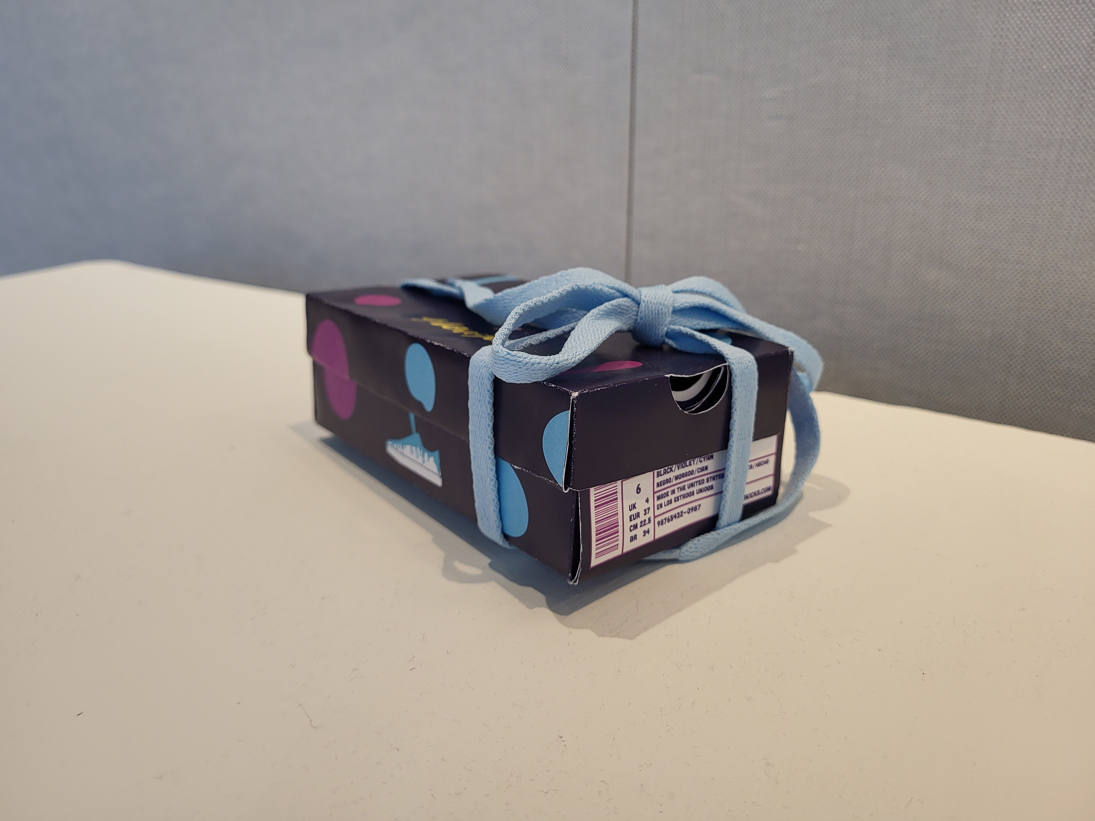 Side view of printed collaboration shoebox