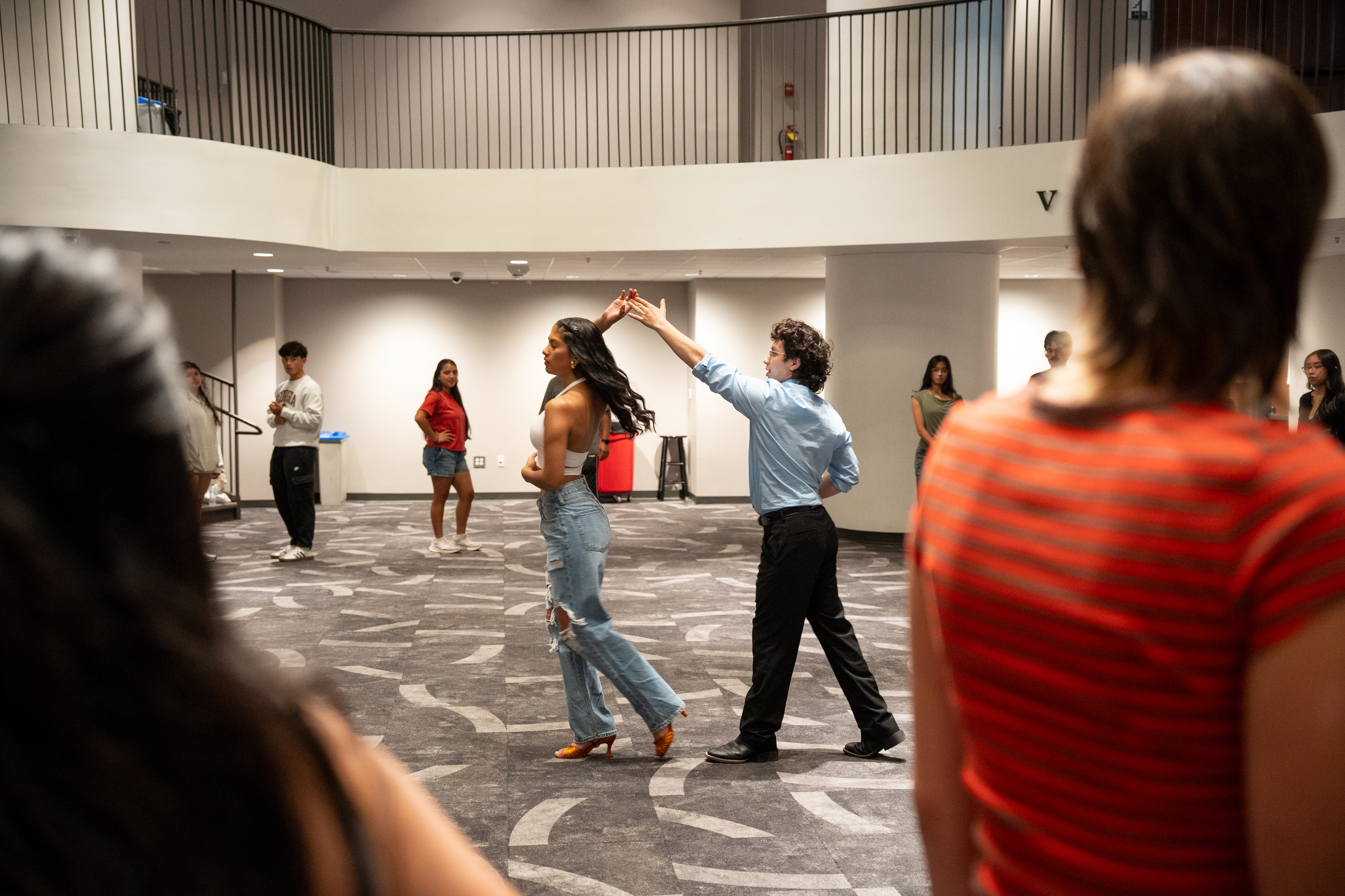 Elián Fabbrini and Lyzsania Badillo lead during Una Noche de Baile at Memorial Hall Ballroom in Athens, Georgia on Tuesday, Sept. 29, 2026. La Unidad Latina, Lambda Upsilon Lambda Fraternity, Inc. and the Hispanic Student Association held a night of dancing where attendees learned Bachata and Salsa. (Photo/Evan Frilingos)