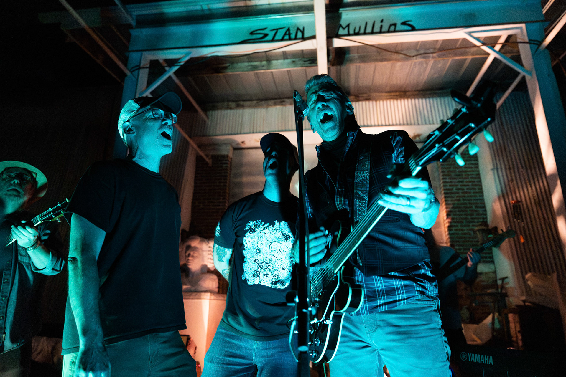 Athens-Clarke County Mayor Kelly Girtz, left, Historic Athens Executive Director Tommy Valentine, center, and Winterville Mayor Dodd Ferrell, right, play at the Mayor’s Show at the end of Porchfest in Athens, Georgia on Sunday, Oct. 19, 2025.(Photo/Evan Frilingos)