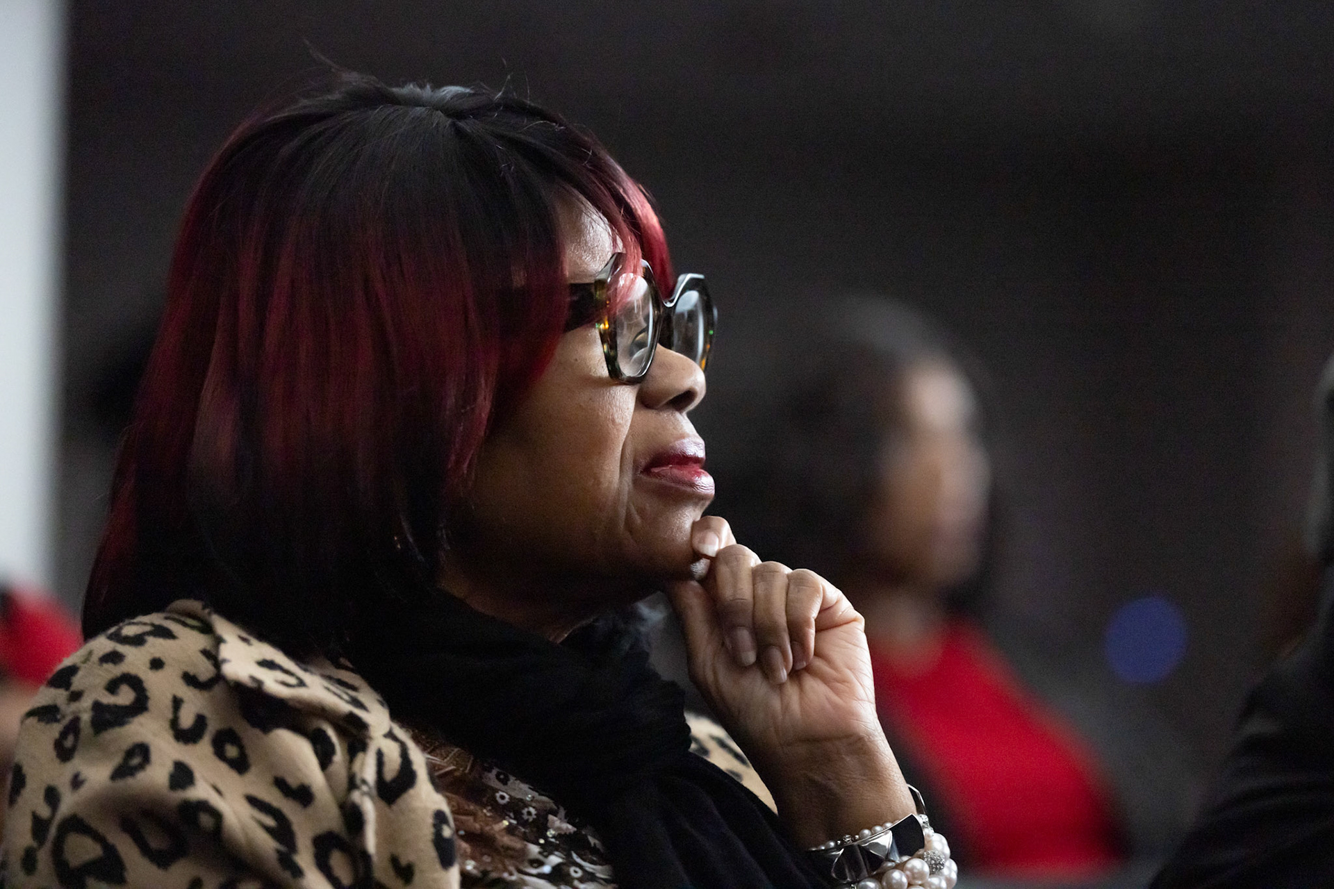 Jackie Wright, director, watches as the Pamoja documentary “Triumph Thru Tears” premieres in the Victor K. Wilson Ballroom in Memorial Hall at the University of Georgia in Athens, Georgia on Sunday, Oct. 26, 2025. (Photo/Evan Frilingos; @frilingos.photos)