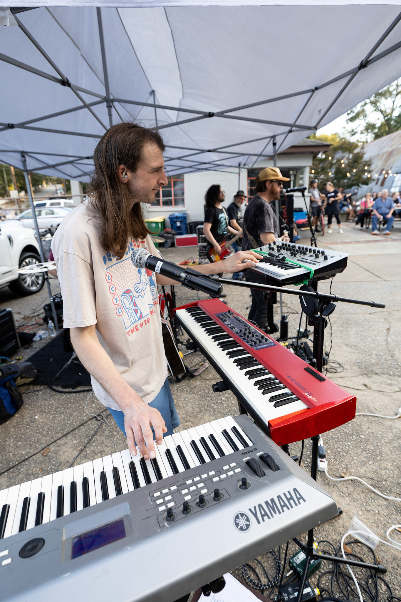 Pianist Mark Plemmons plays with Classic City Jukebox at Porchfest in Athens, Georgia on Sunday, Oct. 19, 2025.(Photo/Evan Frilingos)