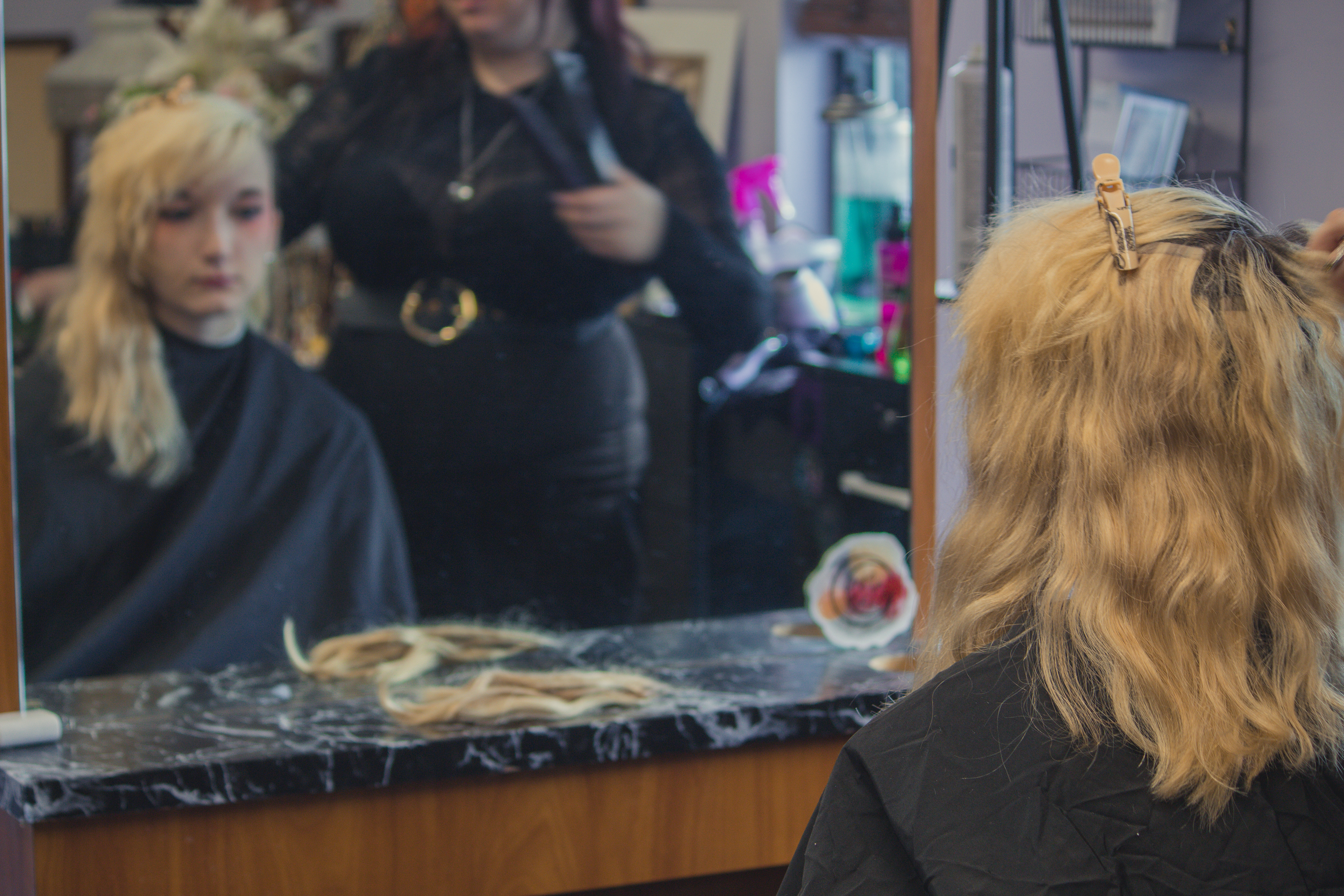 Model Kat Notarnicola (right) pre-shoot, getting ready with the help of Chiaro (left of Kat)