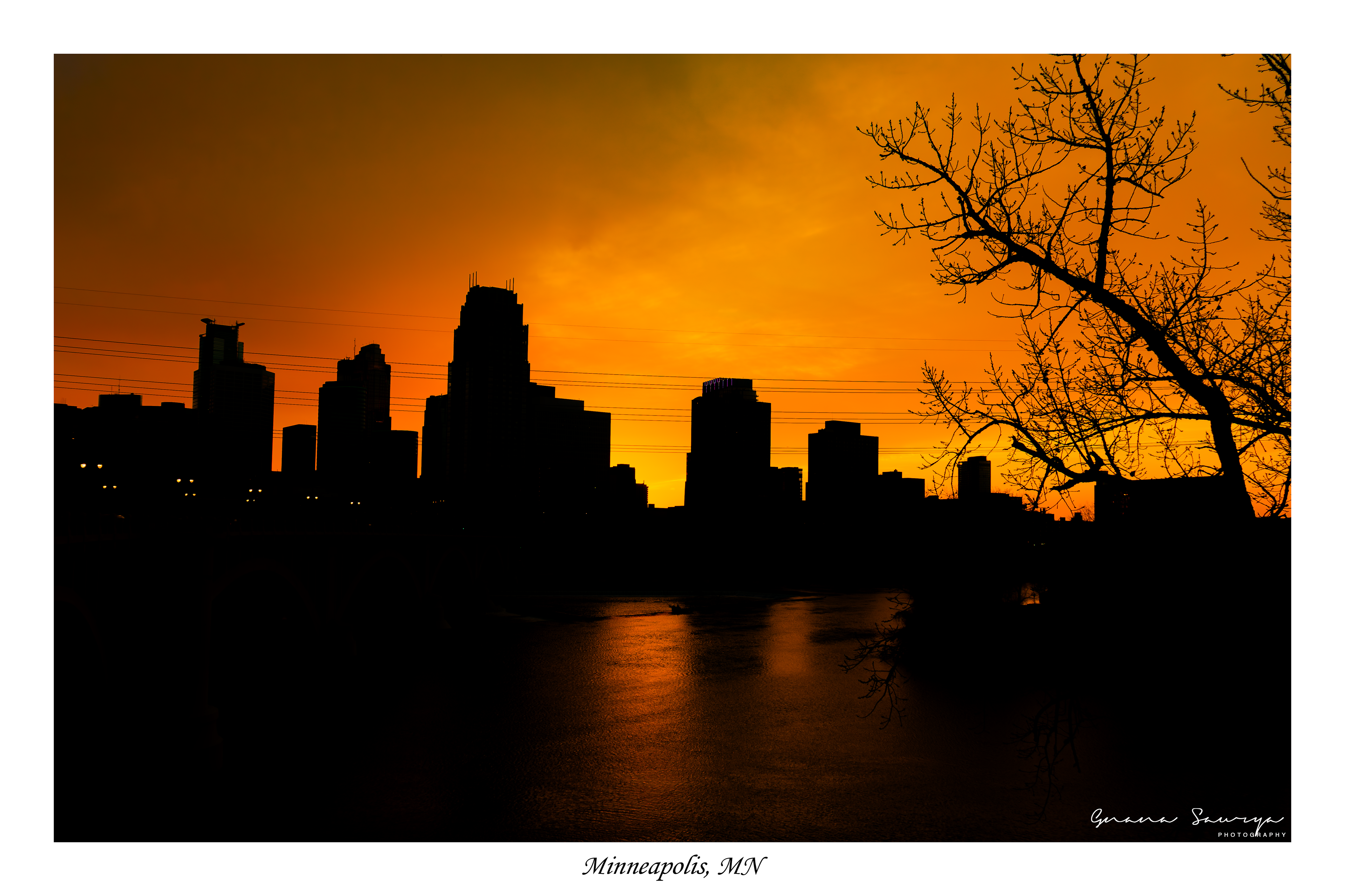 Silhouette Minneapolis skyline from the newly opened Third Avenue Bridge