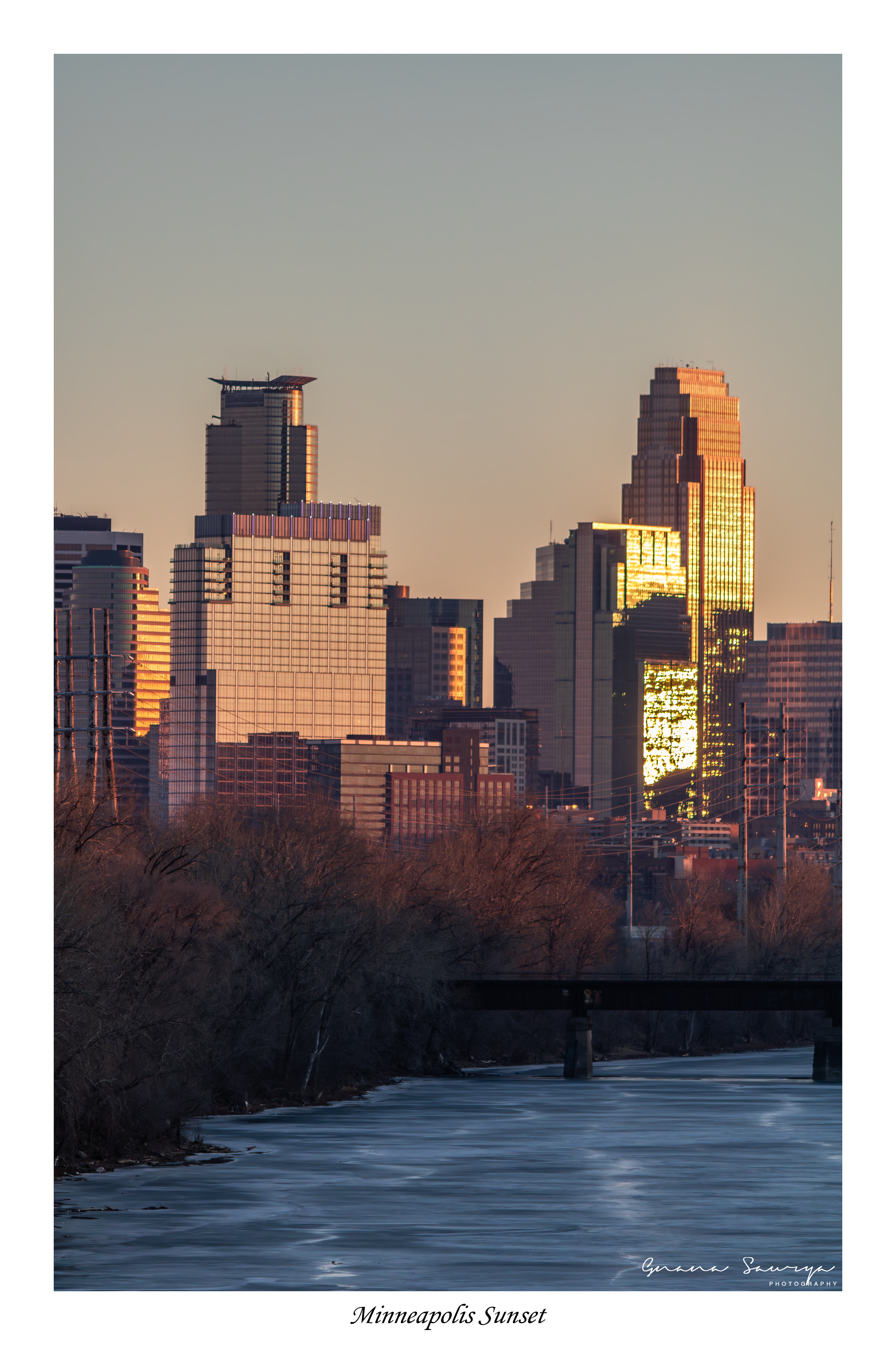 Minneapolis skyline before sunset. Shot from Lowry Avenue Bridge