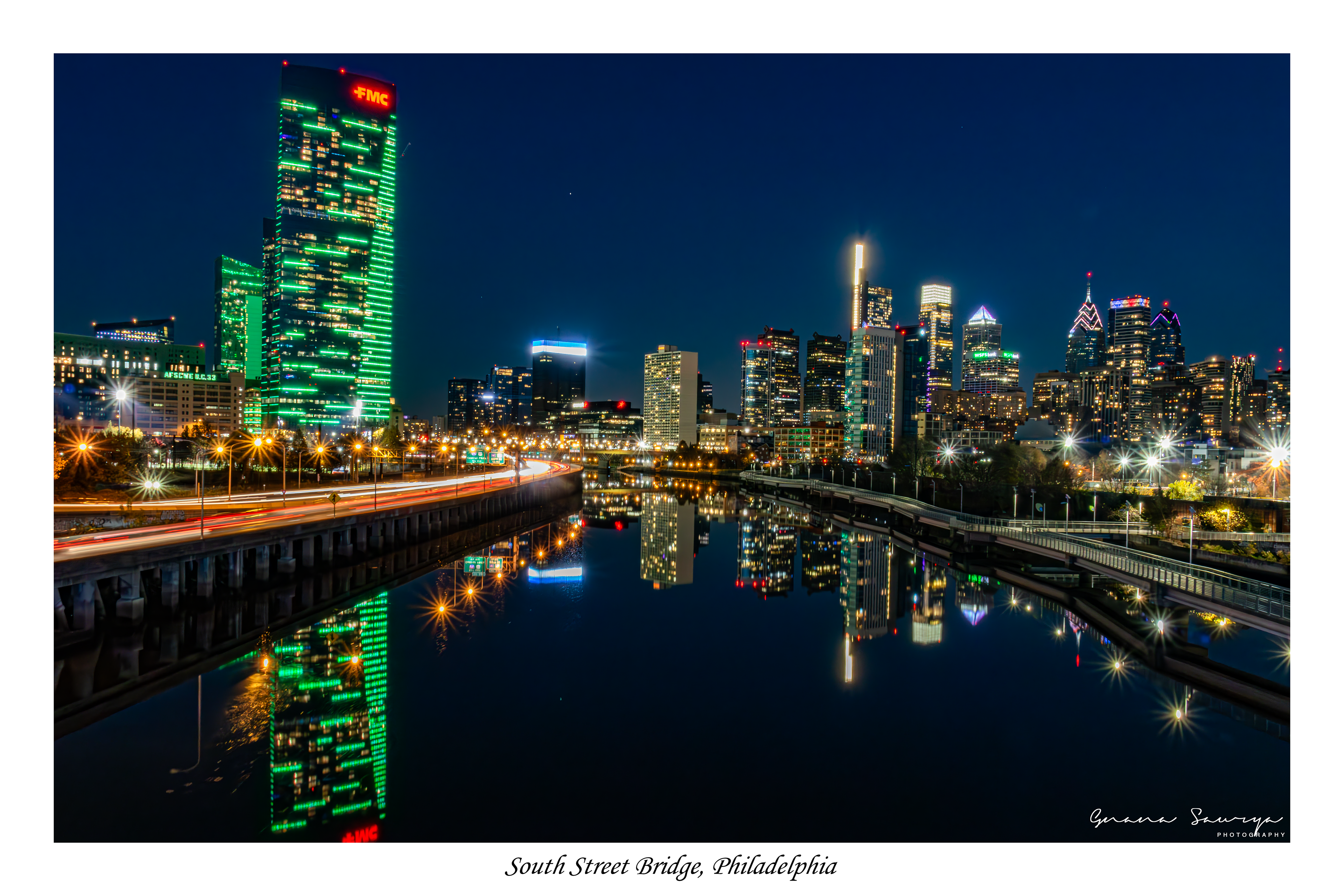 Reflections of Philadelphia skyline from South Street Bridge over Schuylkill River