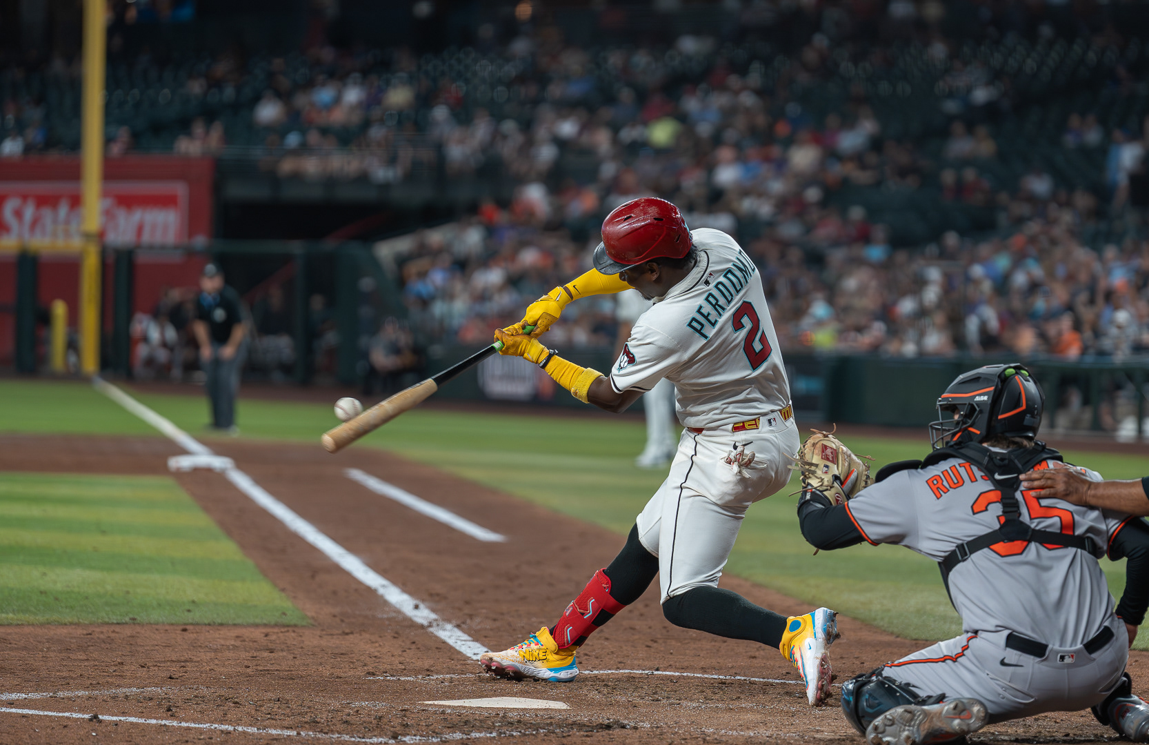 Geraldo Perdomo, Arizona Diamondbacks infielder, connects with a ball during a home game against the Baltimore Orioles at Chase Field on Wednesday, April 9, 2025 in Phoenix, Arizona.