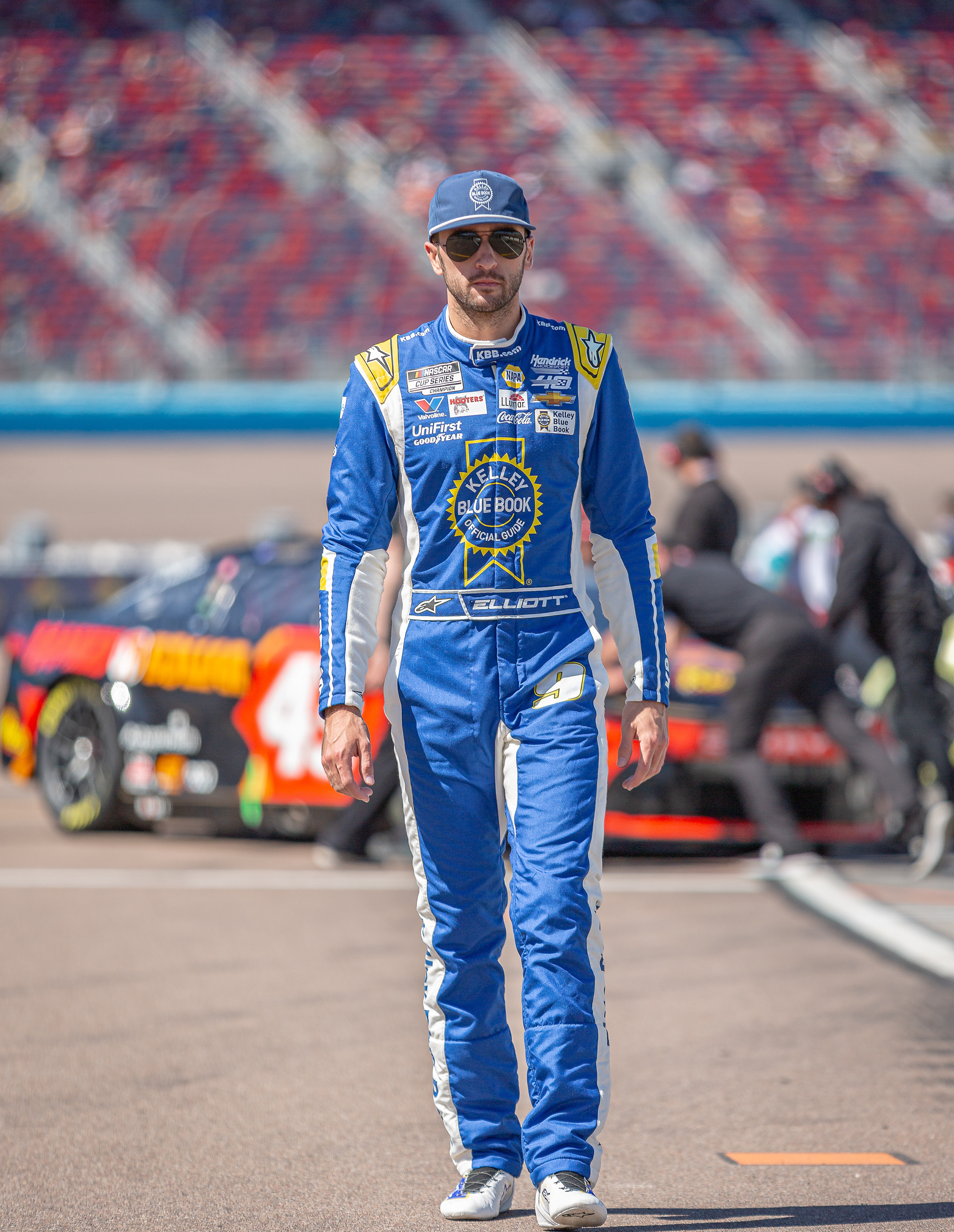 Chase Elliott, NASCAR Cup Series driver, walks to his car on pit road during qualifying laps at Phoenix Raceway on Saturday, March 9, 2024 in Avondale, Arizona.