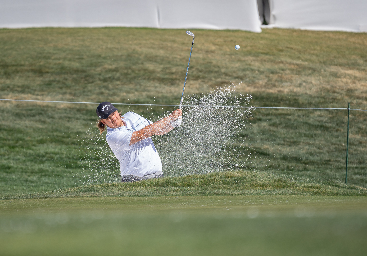 Sami Valimaki hits a shot from a bunker during practice rounds at TPC Scottsdale on Tuesday, February 4, 2025 in Scottsdale, Arizona. 