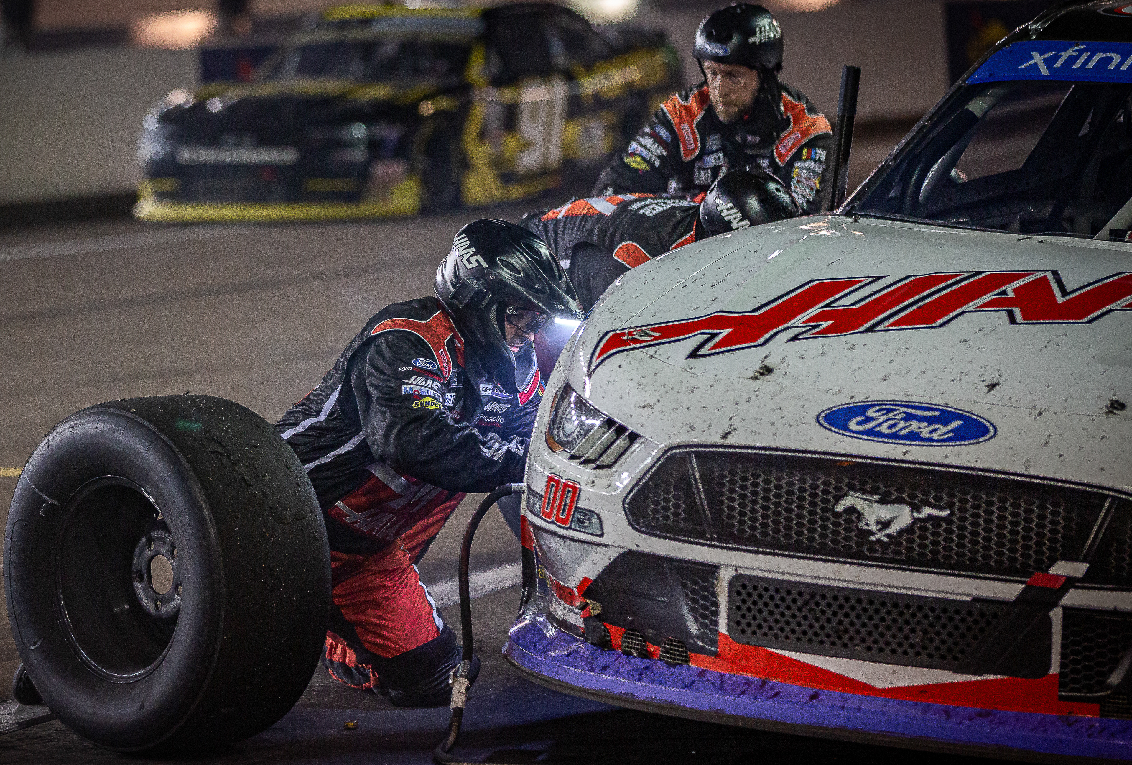 Cole Custers pit crew does a tire change on his car during a pit stop at Phoenix Raceway on Saturday, November 4, 2023 in Avondale, Arizona. 