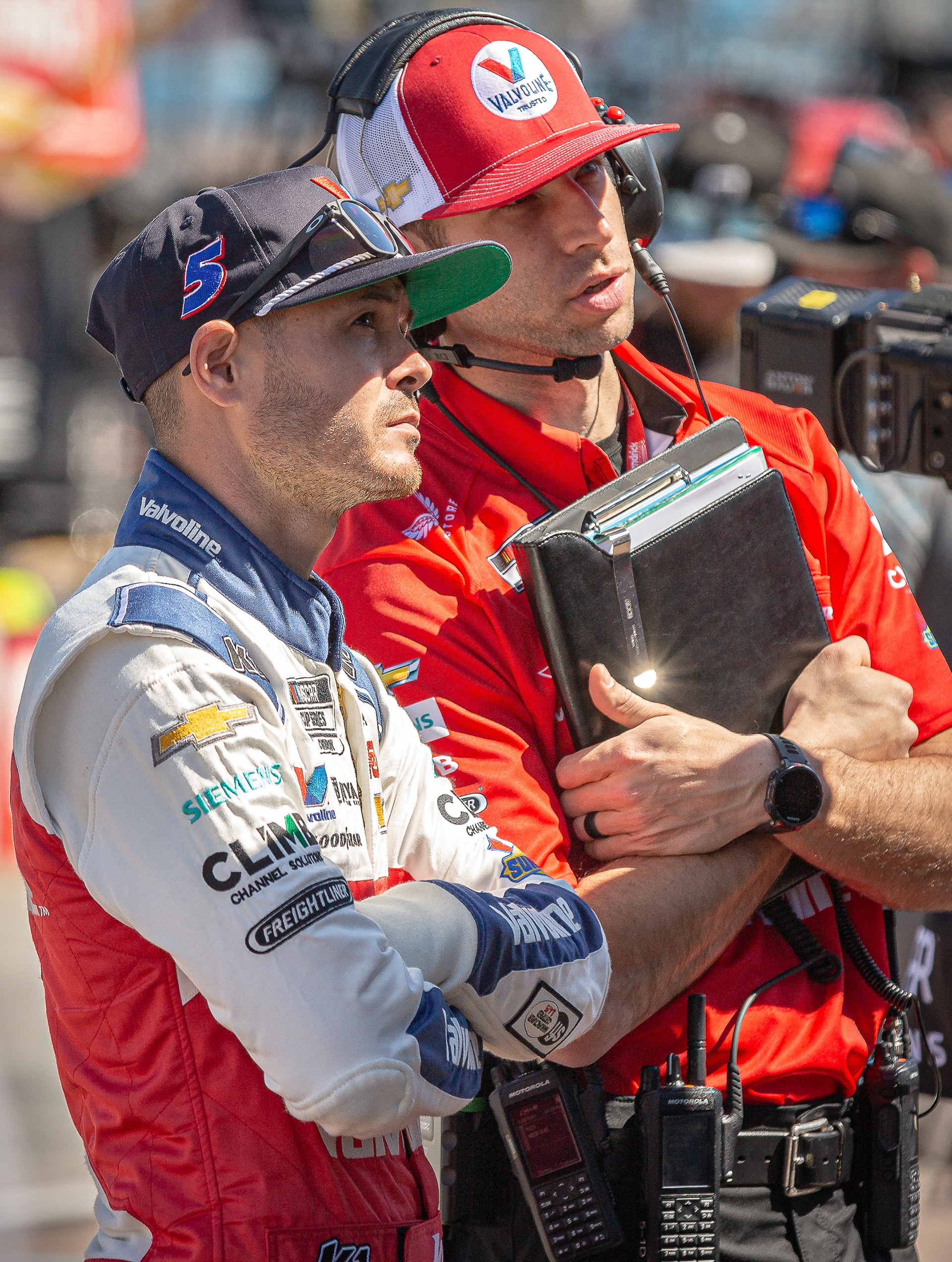 Kyle Larson, NASCAR Cup Series driver, and crew chief Cliff Daniels talk during qualifying laps at Phoenix Raceway on Saturday, March 9, 2024 in Avondale, Arizona.