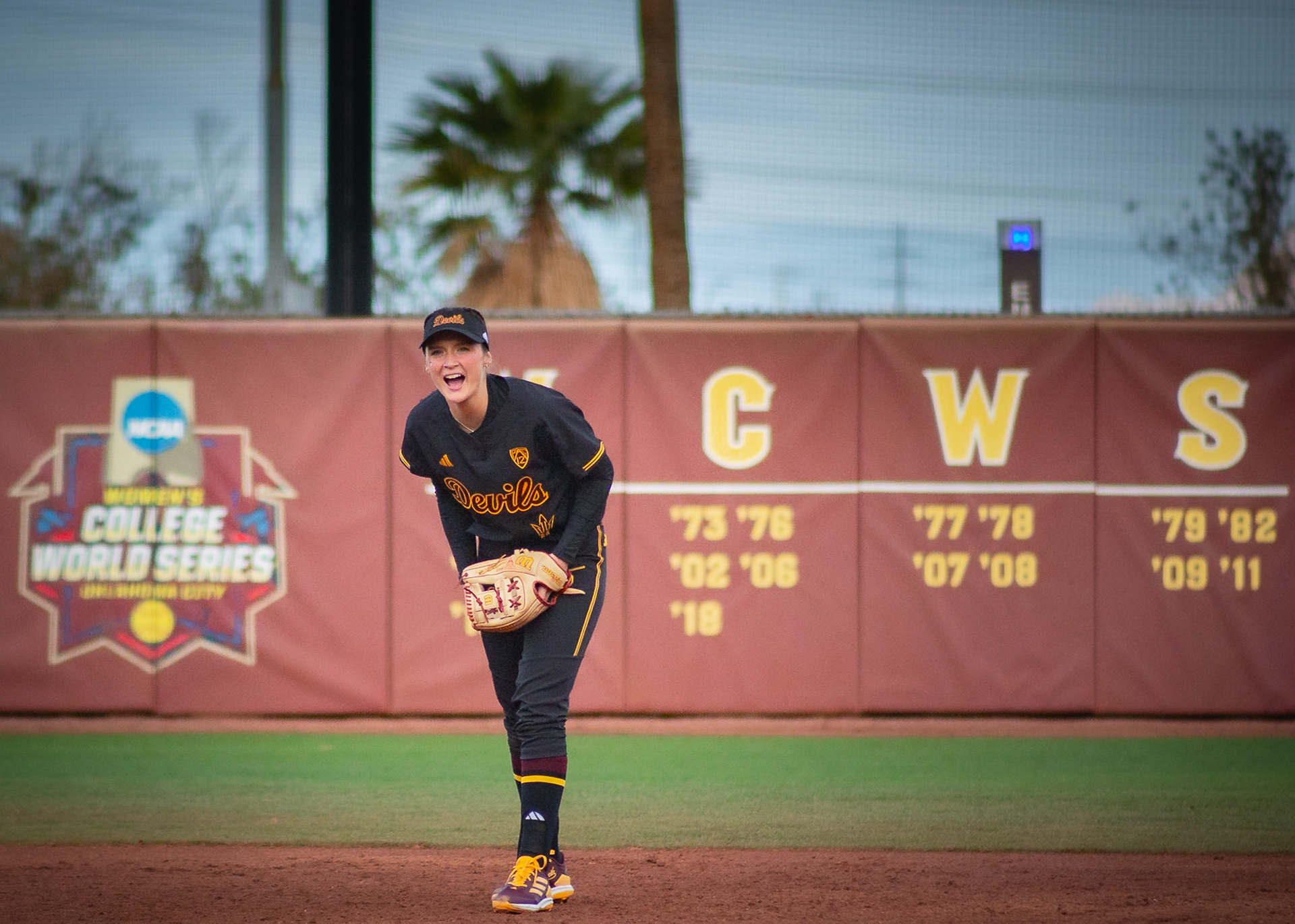 Audrey LeClair, Arizona State University infielder, yells to her team to let them know the fielding situation during a game at Alberta B. Farrington Softball Stadium in Tempe, Arizona.