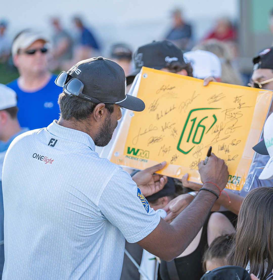  Sahith Theegala signs autographs for fans after finishing up his practice round at TPC Scottsdale on Tuesday, February 4, 2025 in Scottsdale, Arizona. 