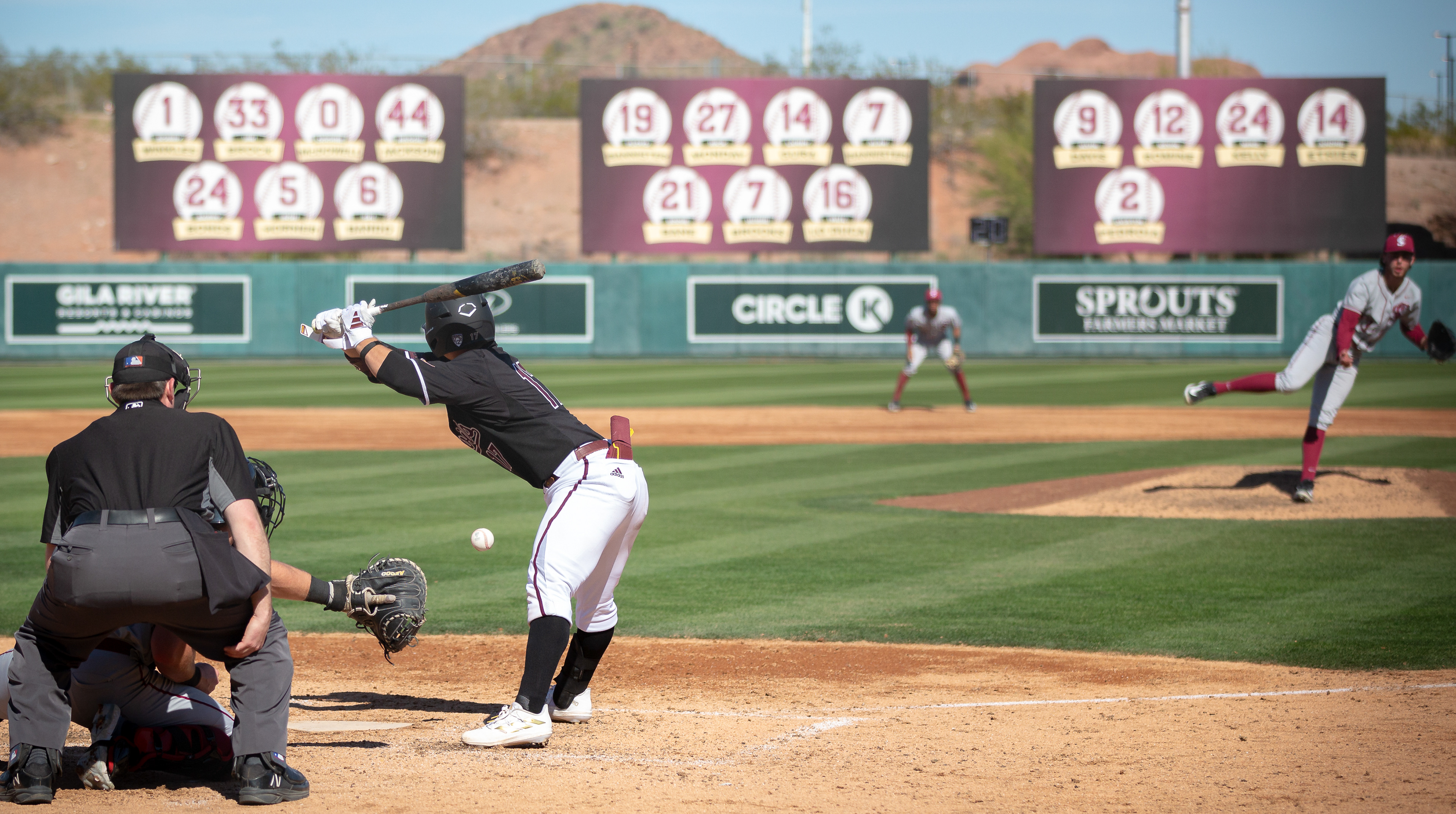  Ryan Campos, Arizona State University catcher, gets out of the way of a pitch headed towards him during a game against Santa Clara at Phoenix Municipal Stadium on Saturday, February 17, 2024 in Phoenix, Arizona. 