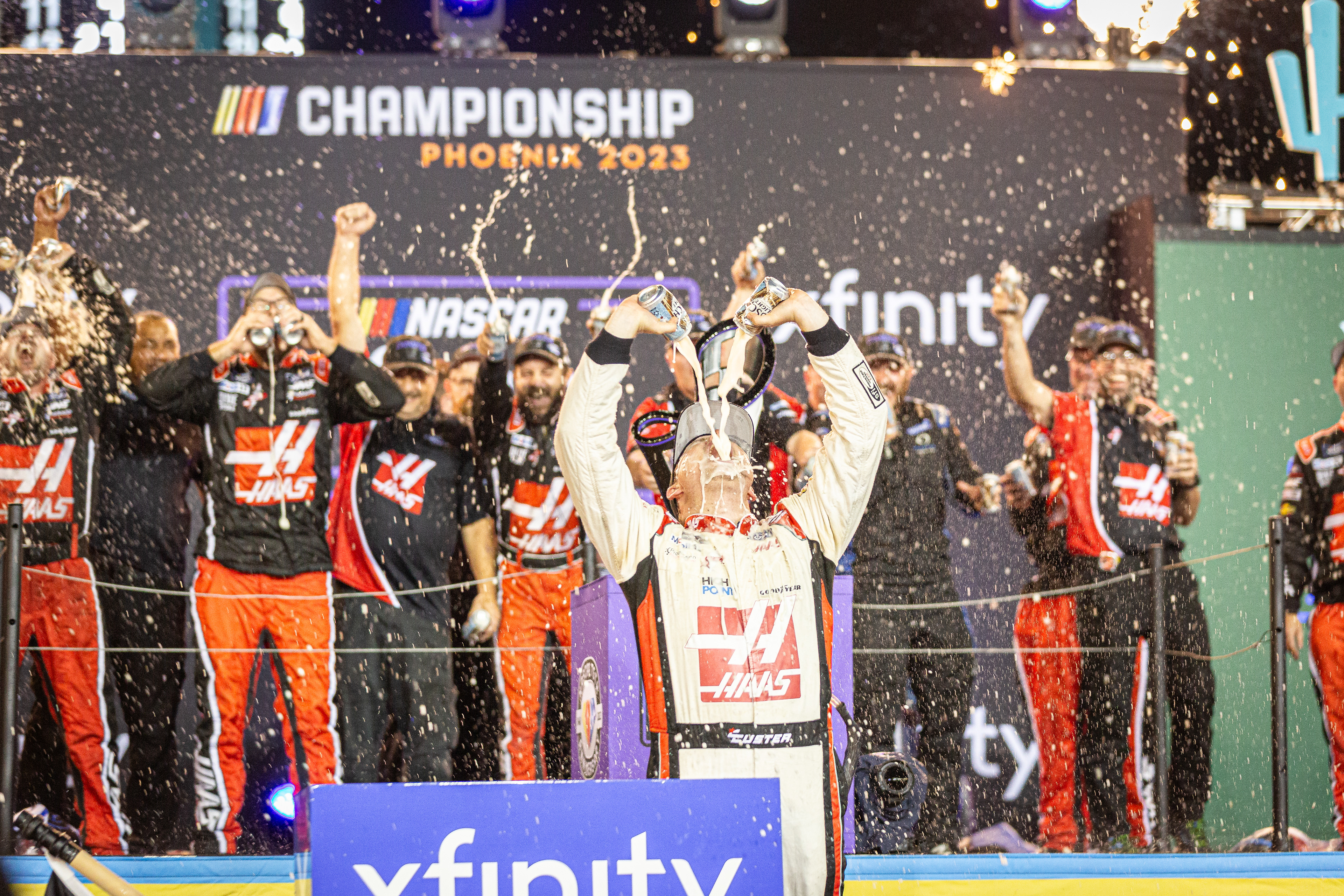 Cole Custer, NASCAR Xfinity Series driver, drinks a celebratory beer after winning the 2023 Xfinity Series Championship at Phoenix Raceway on Saturday, November 4, 2023 in Avondale, Arizona.
