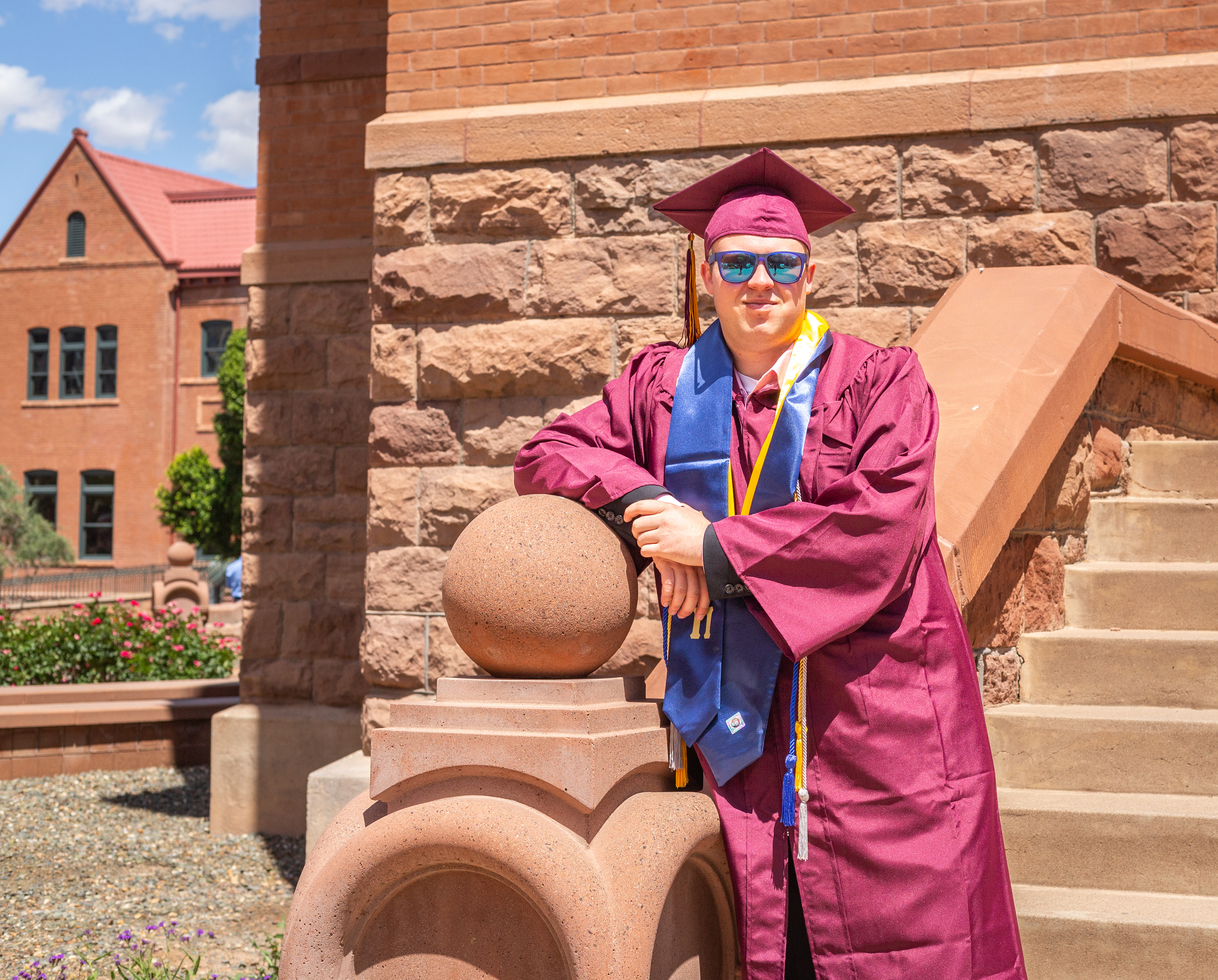 Tyler Baum, Arizona State University graduate, outside of Old Main in Tempe, Arizona.