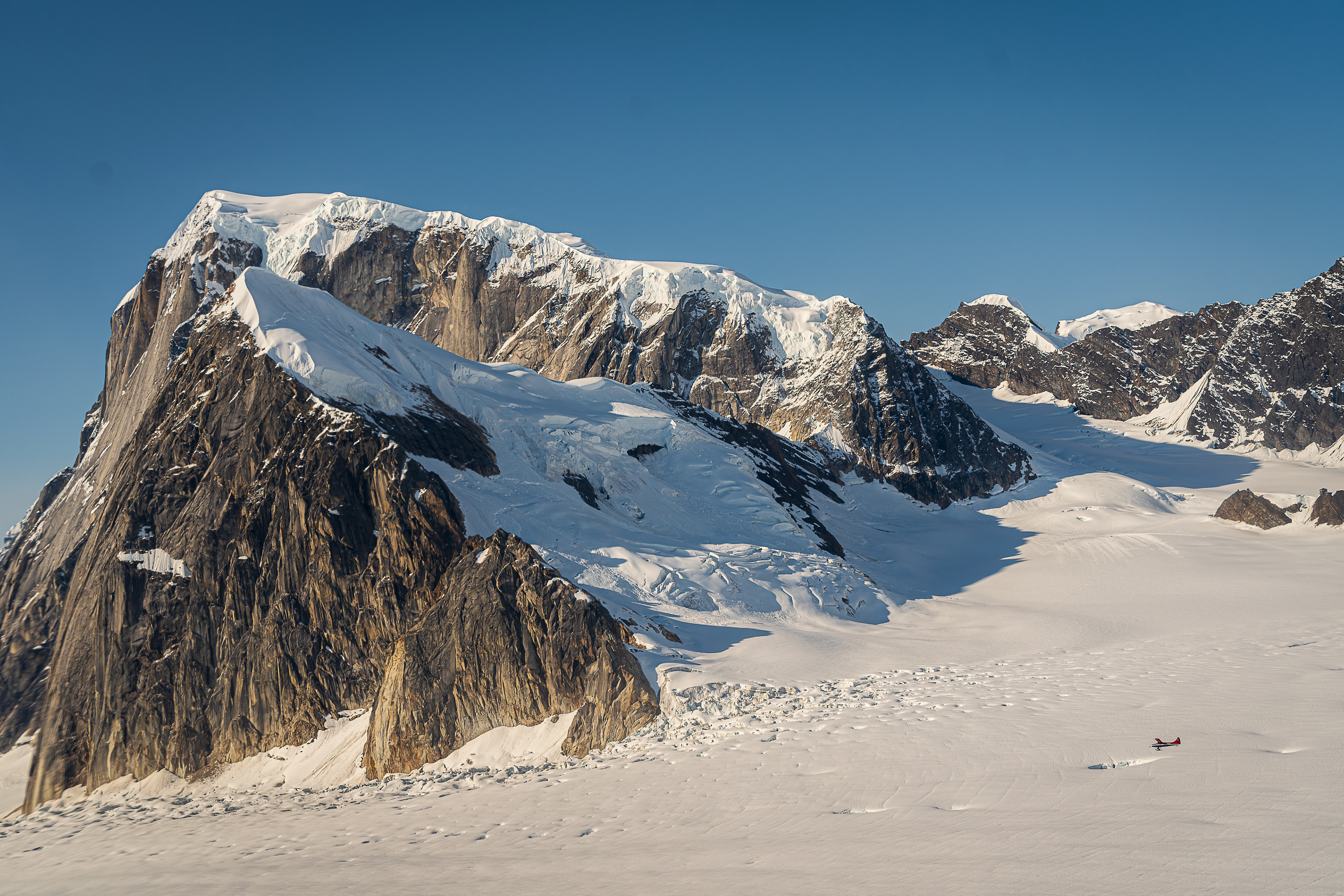 Plane flying in front of Mount Barrille/Ruth Amphitheater  - Denali National Park