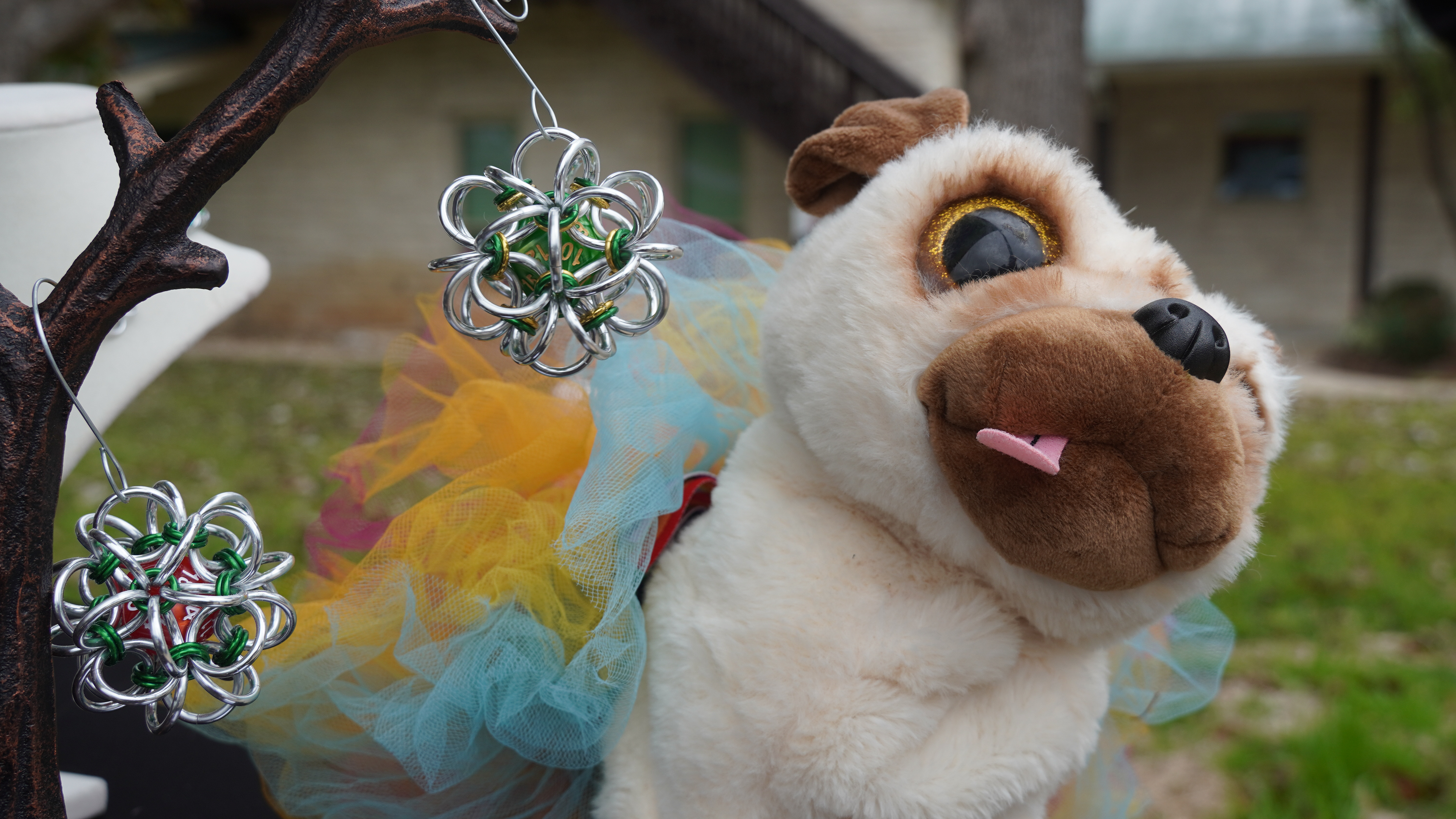 Handmade dice cages and stuffed toys.