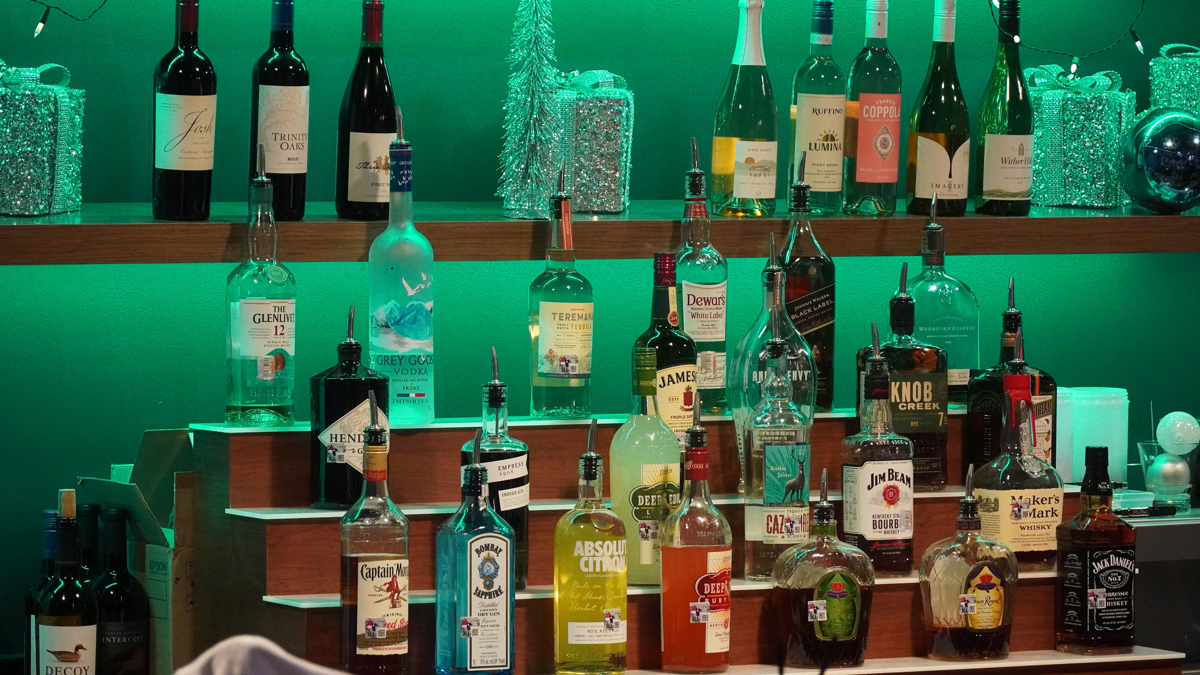 Bar staff asking for a picture of their holiday decorated bar.