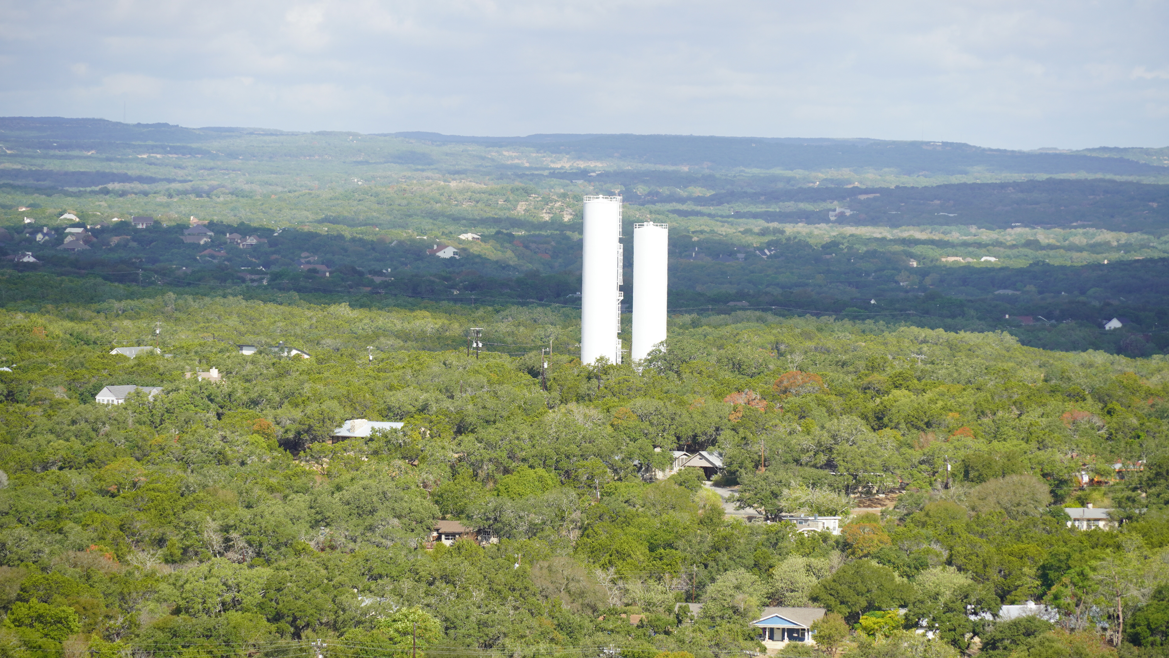 Broad shot of a small town from a high elevation. 