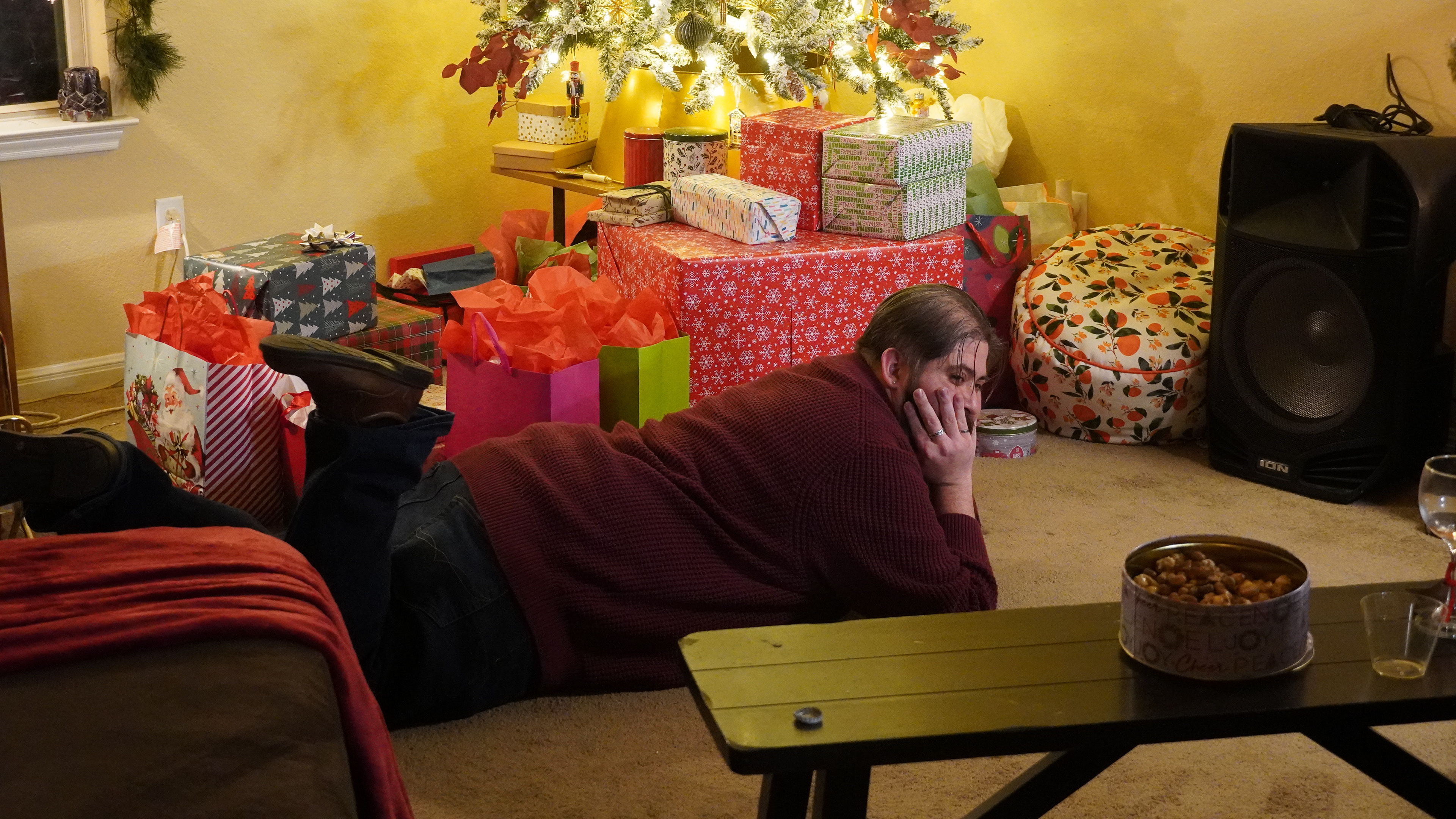 Posing in front of the Christmas tree at a holiday party. 