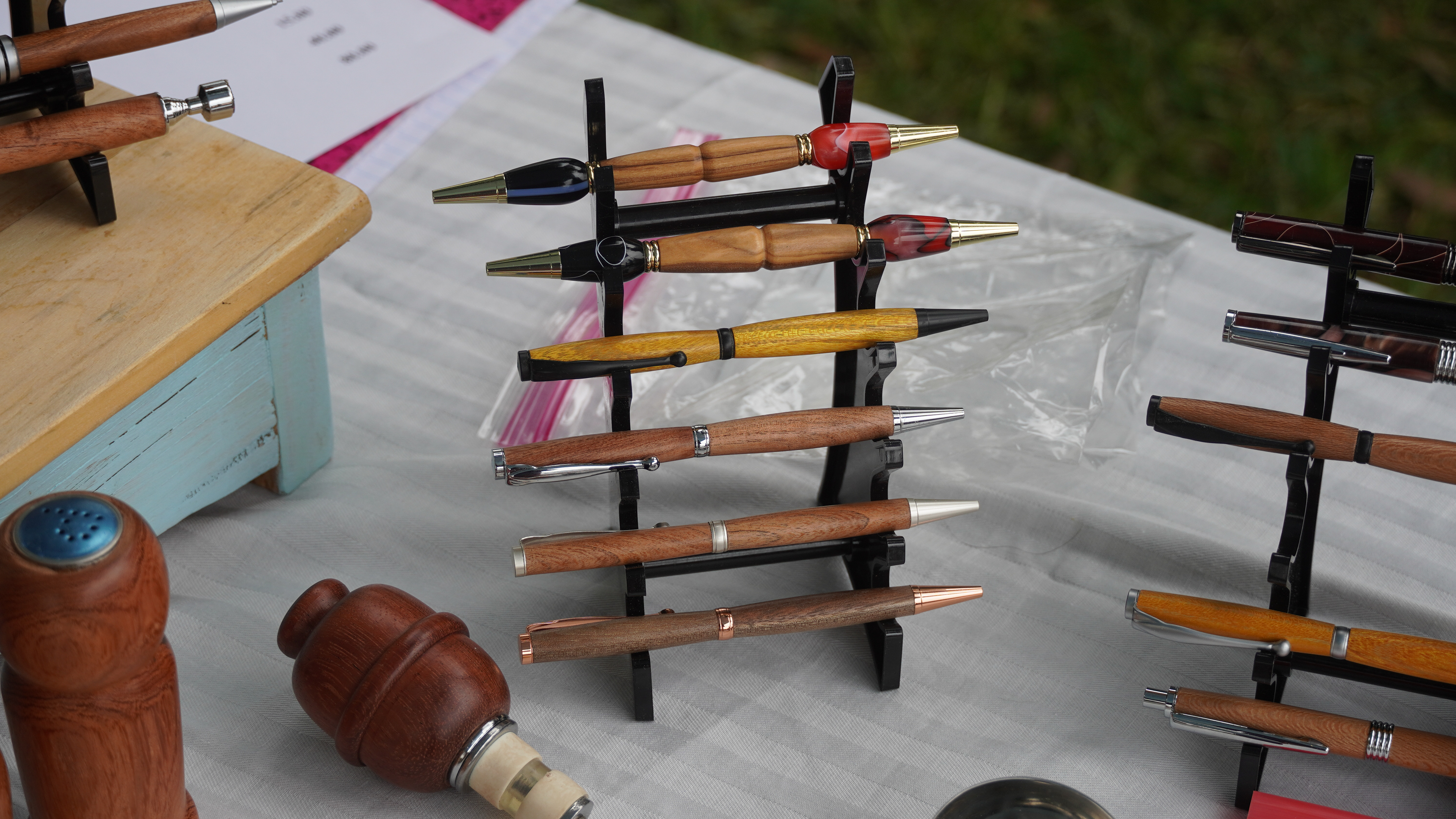 Machine cut wooden pens at a popup event. 