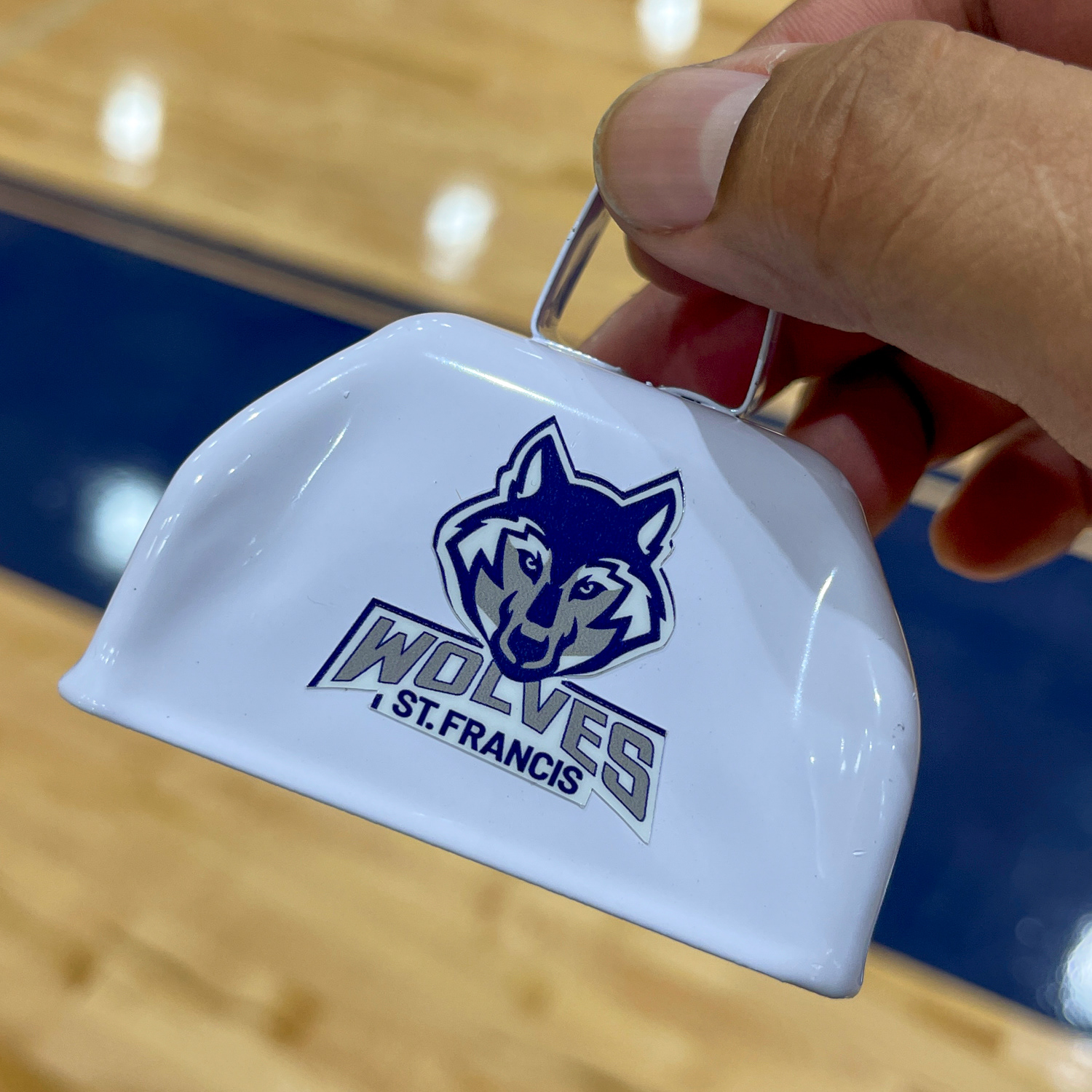 St. Francis Wolves logo applied to football cowbell