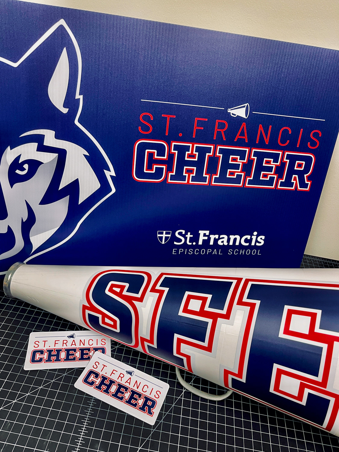 Yard signs, stickers, and lettering applied to megaphone