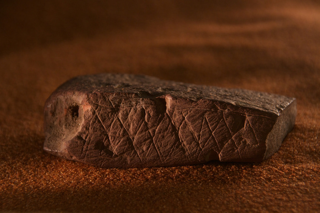 Our ancestors used bone and stone tools to grind ochre, charcoal and other elements in abalone shells to manufacture pigment and paint. ©Craig Foster