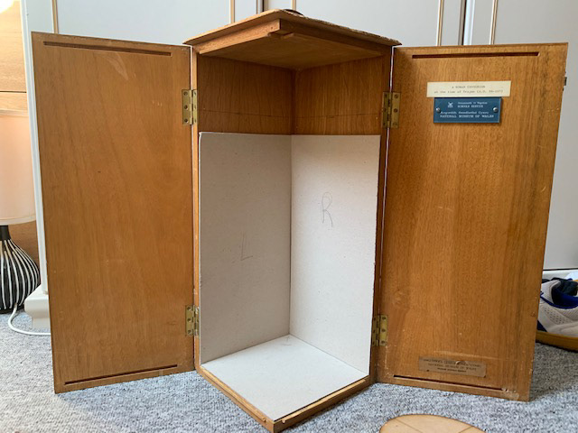 museum display case gets covered in card