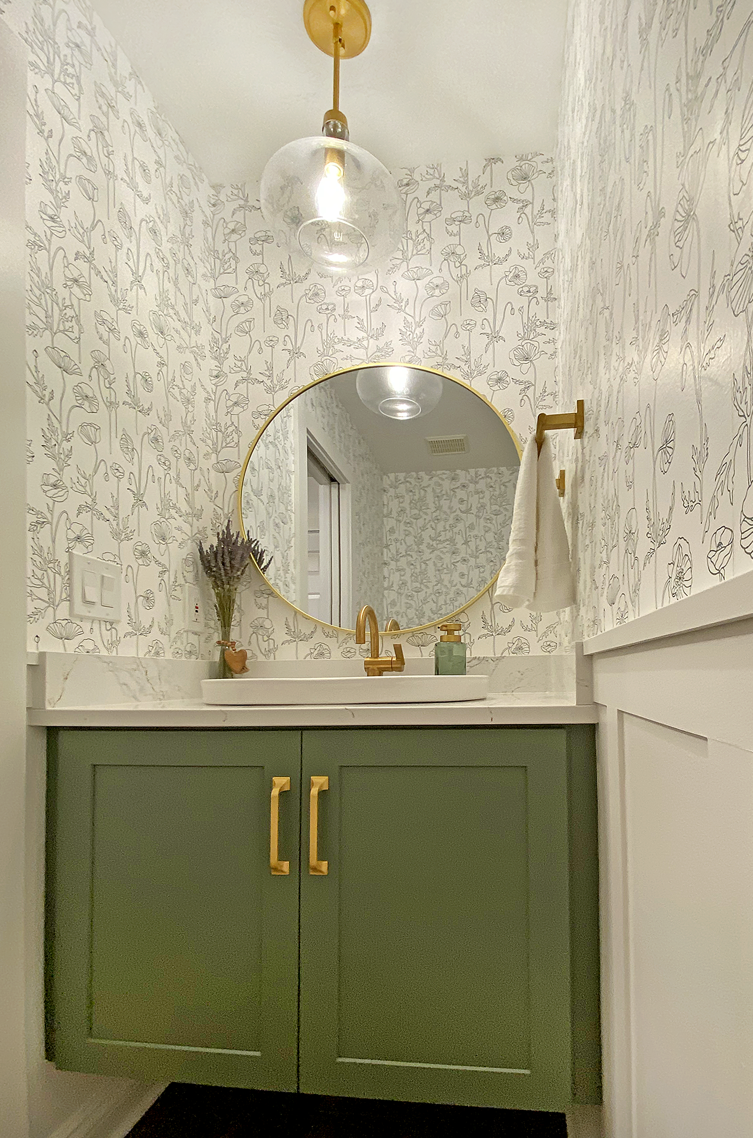 Powder Room with Floating Cabinet, Quartz Top, and Gold Accents