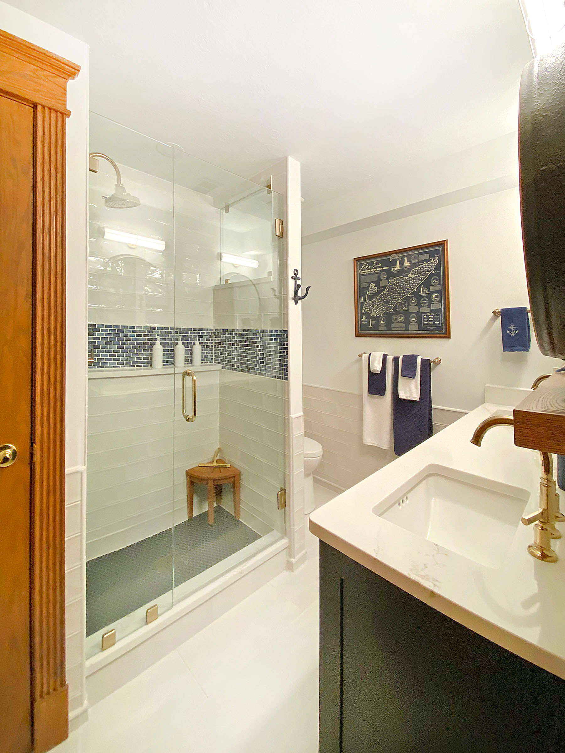 Decorative Subway Tile Shower with Blue Accents