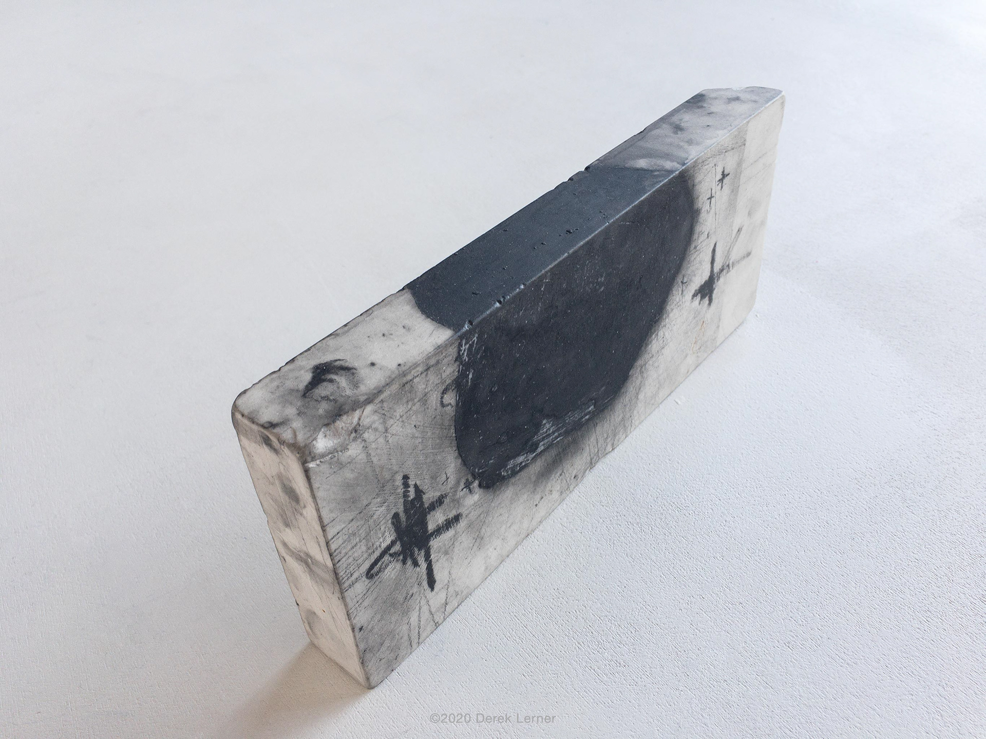 2020062201, 2020 Graphite, engineered marble, and varnish 9.5" x 4" x 1.25" (24.13cm x 10.16cm x 3.175cm) by Derek Lerner