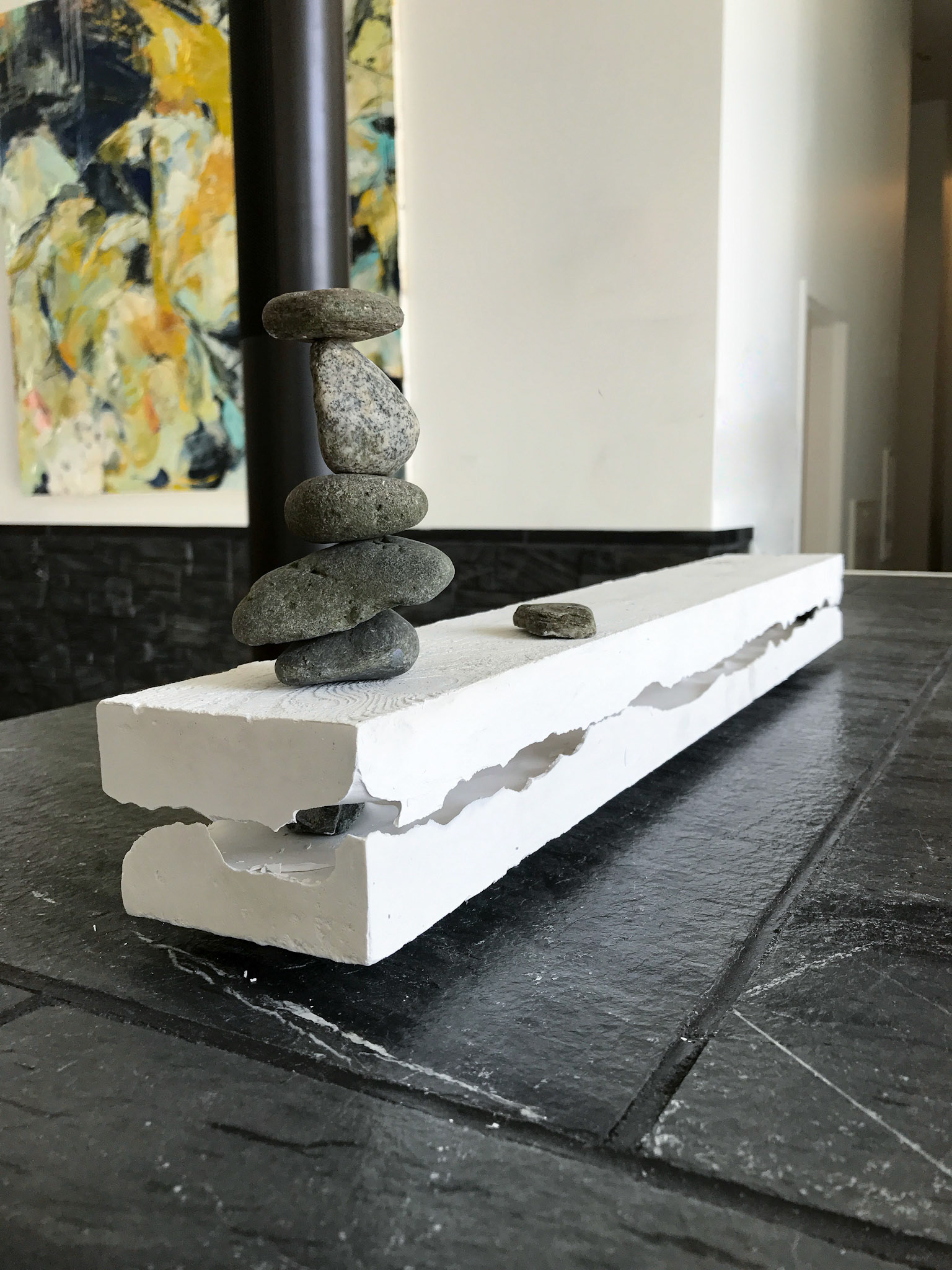 Balance, 3x25x6 Inches, Plaster Cast of Reclaimed Pallet Wood, Stones, Instillation Shot (Detail), 2019 