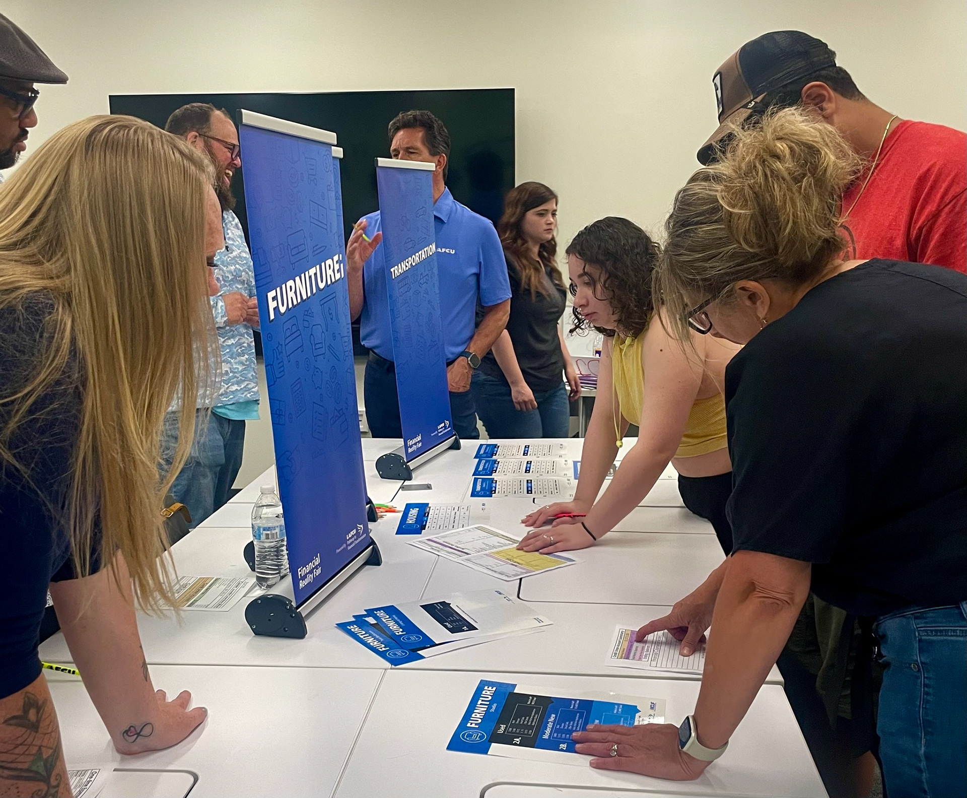 LAFCU's Financial Reality Fair in motion with its updated banners and packets