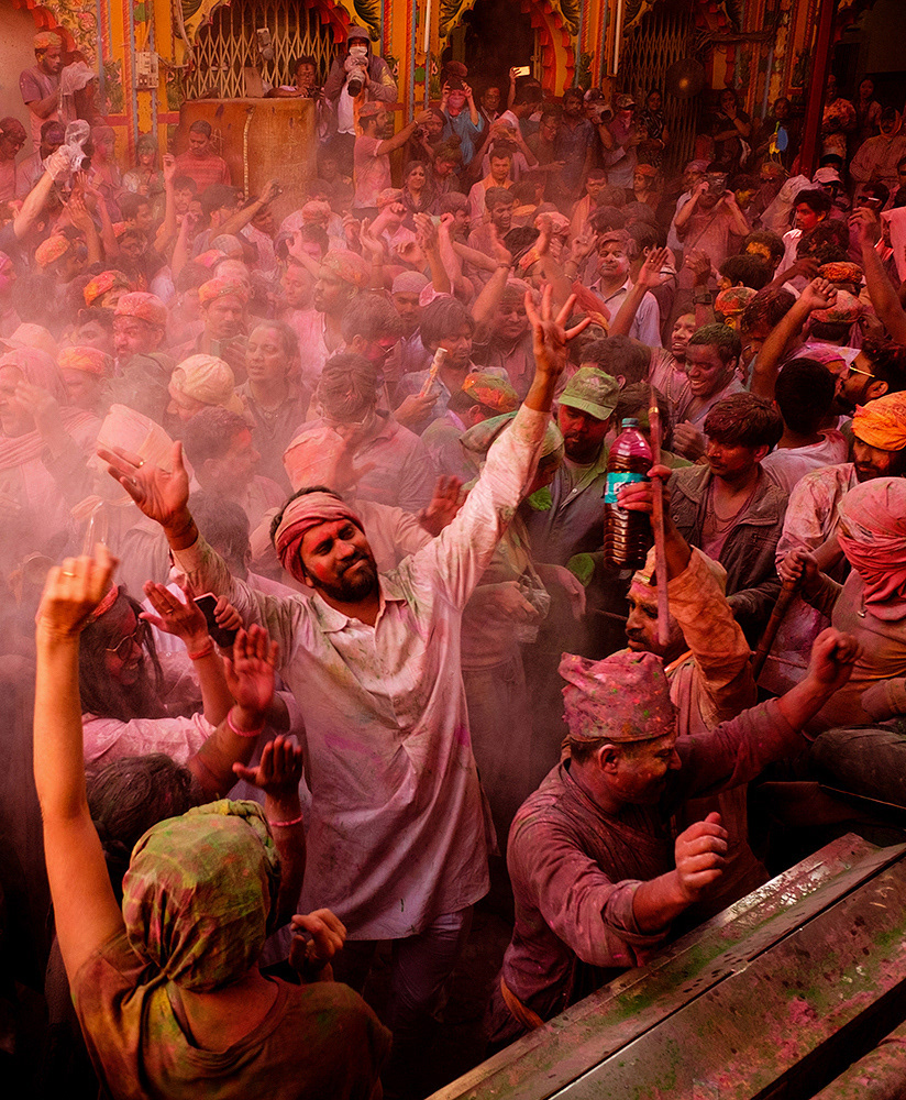 In Mathura, India, people throw colorful powder, sing and dance to celebrate the annual Holi festival. Mar, 2017