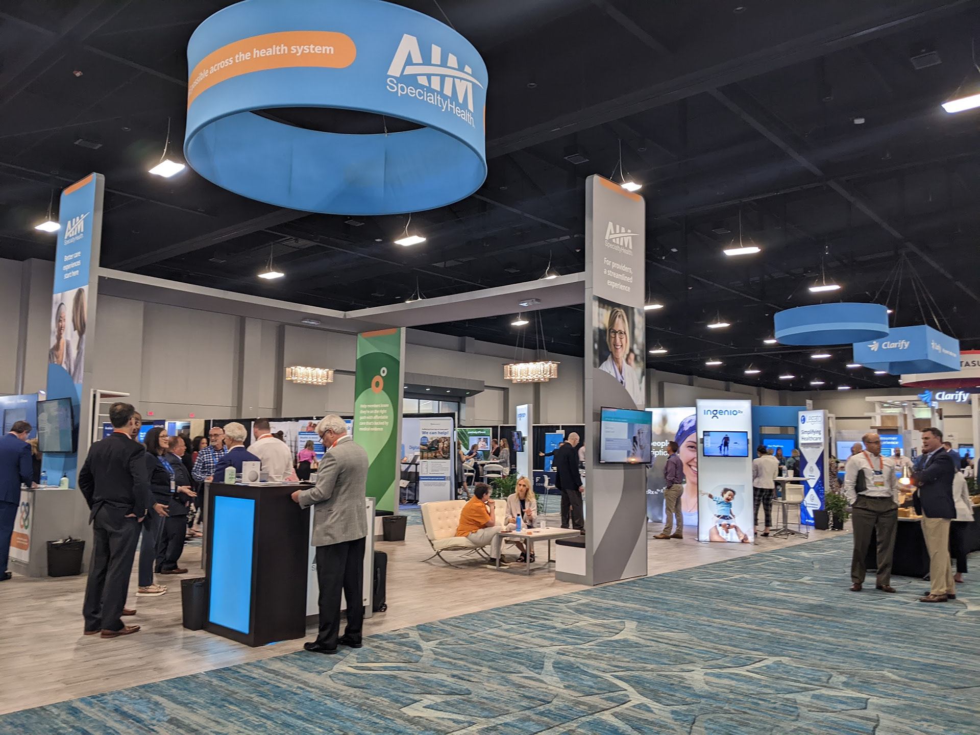 Developed the comprehensive design for the AIM Blue Summit booth, showcasing the integrated functionality of the Envoy Panels and the seamless cohesion of all booth elements.
