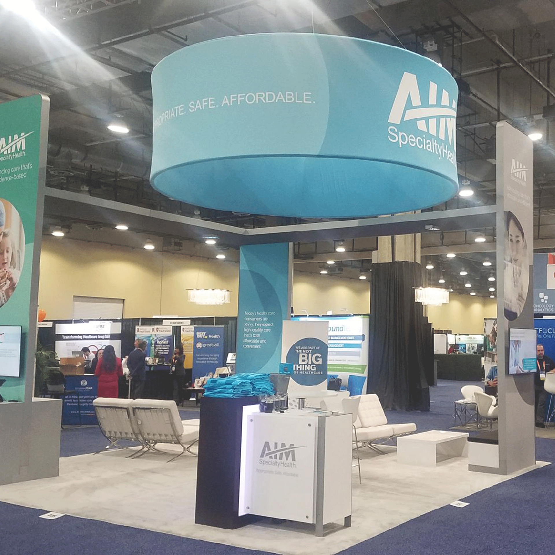 Developed the comprehensive design for the AIM Blue Summit booth the first year, showcasing the integrated functionality of the Envoy Panels and the seamless cohesion of all booth elements.