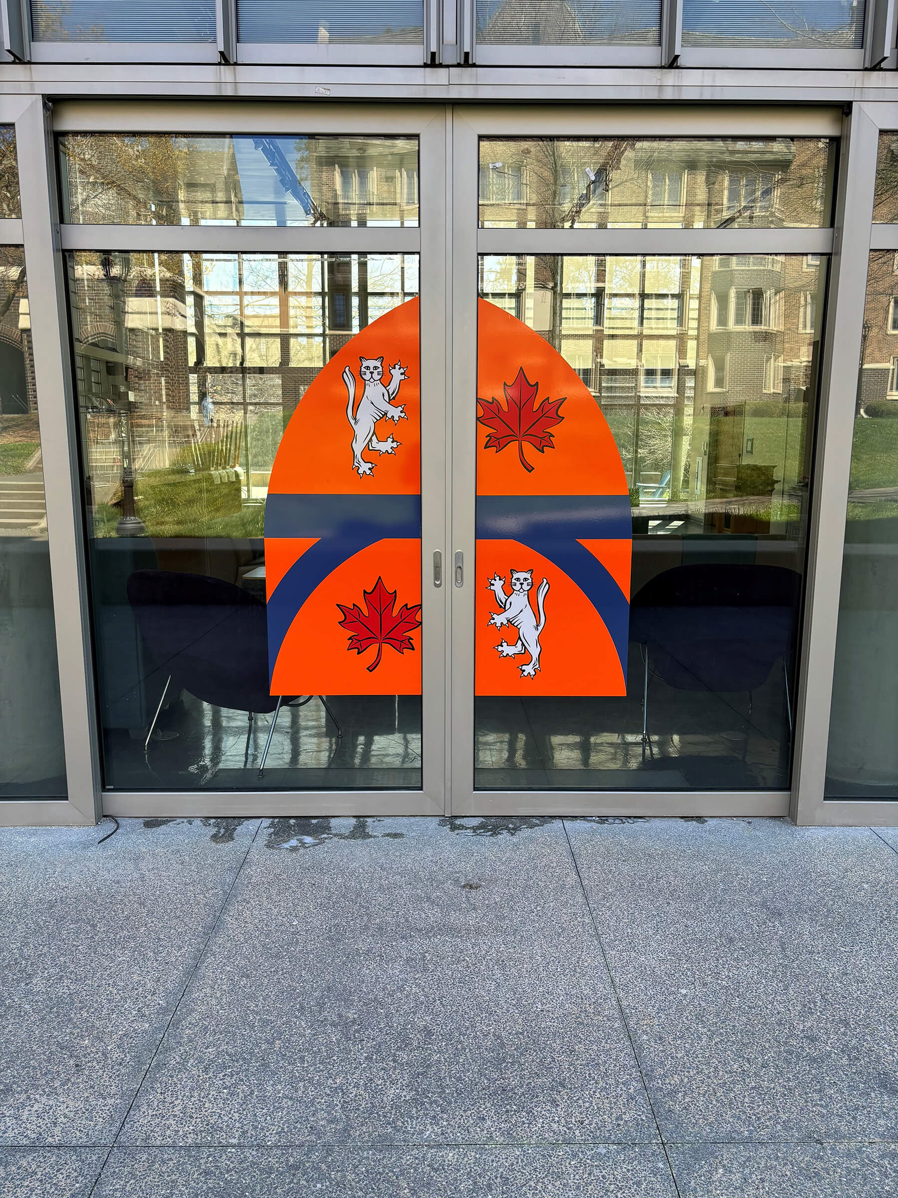 Contour cut, laminated digital prints applied to front and back of glass doors • Keohane House • Duke University • Durham, NC