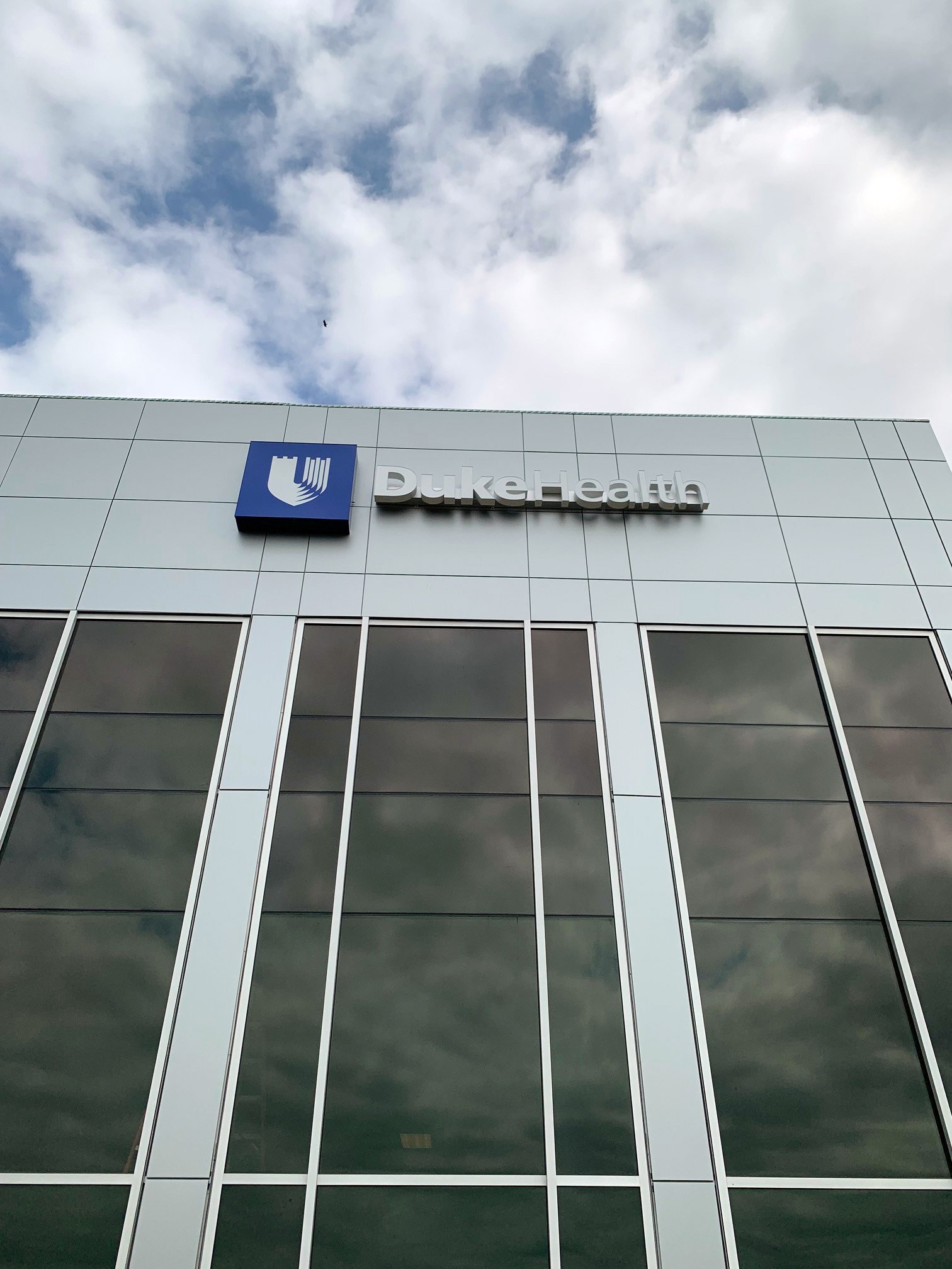 Duke Health Illuminated Raceway Logo (Side Elevation, Facing Street) • Arringdon • Durham/Morrisville, NC