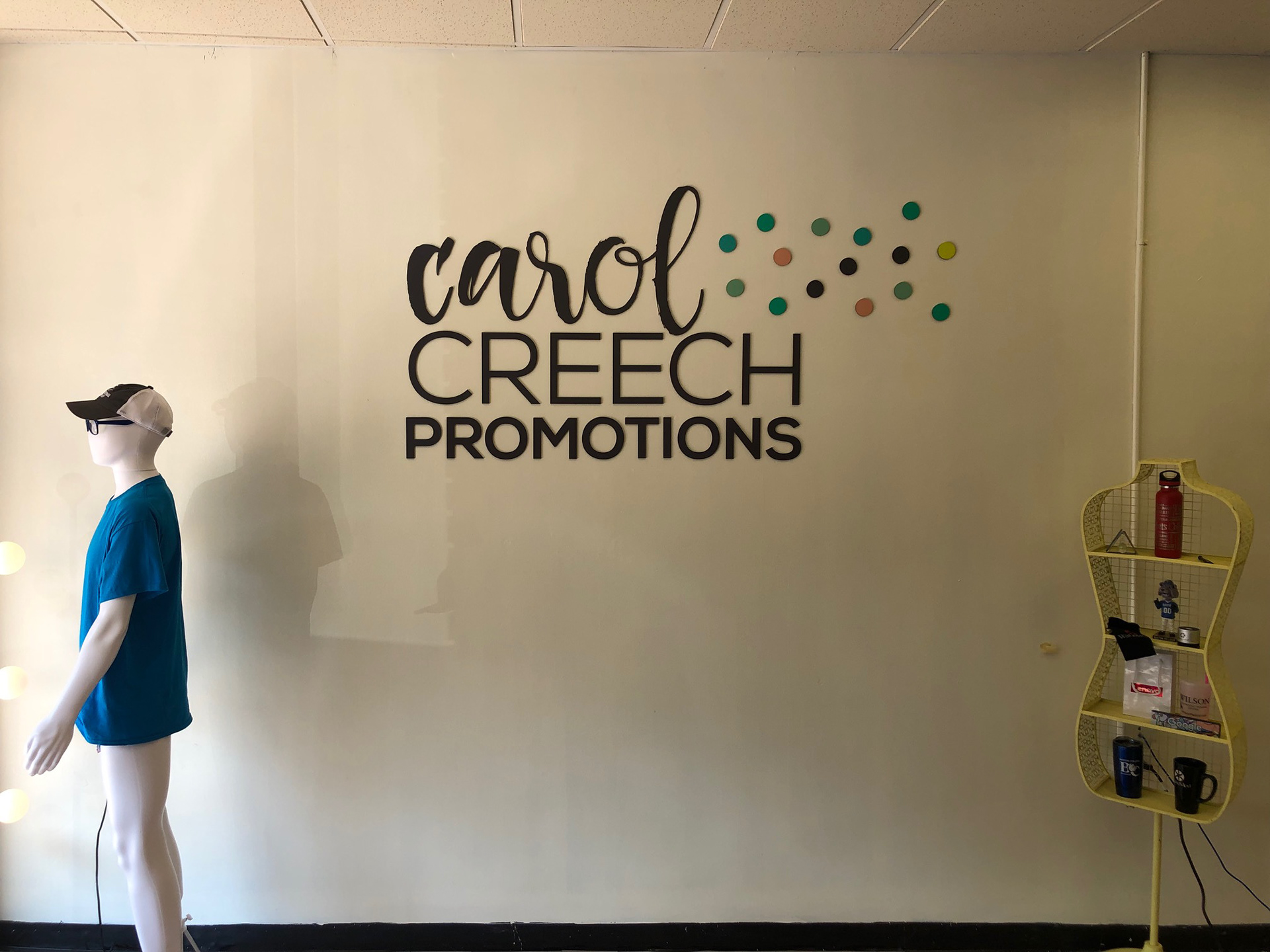 Laser cut acrylic wall logo with print vinyl overlays • Carol Creech Promotions • Wilson, NC