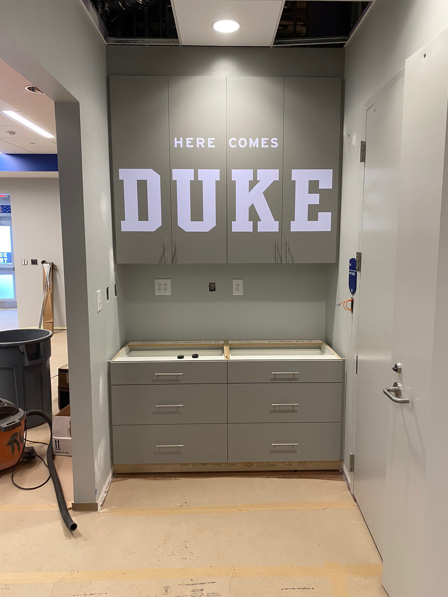 Duke Field Hockey • "HERE COMES DUKE" cabinet letters (matte white vinyl)