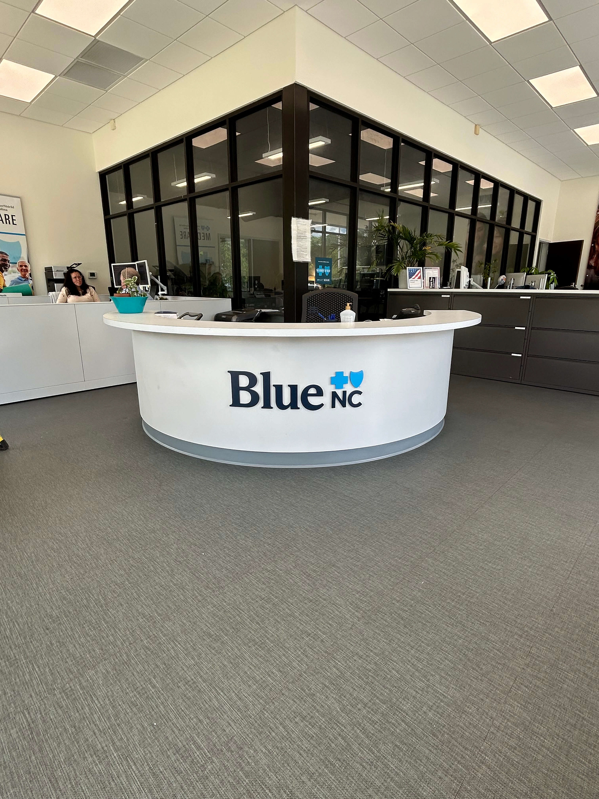 Painted acrylic desk logo • BCBSNC "Blue NC" Agent Office • Asheville, NC